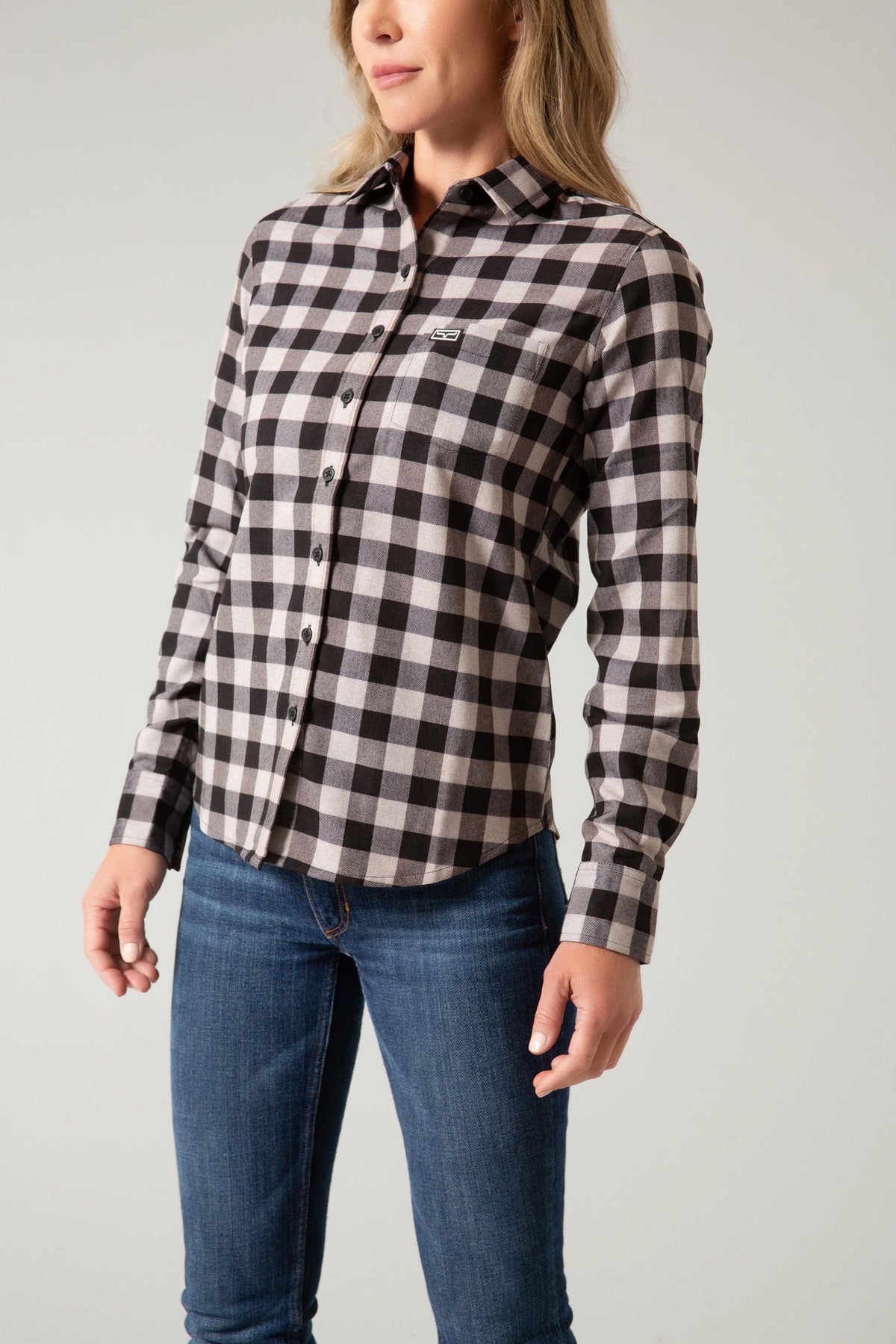Kimes Ranch Ladies Garrison long sleeve button-up top in black and white check with a chest pocket and logo