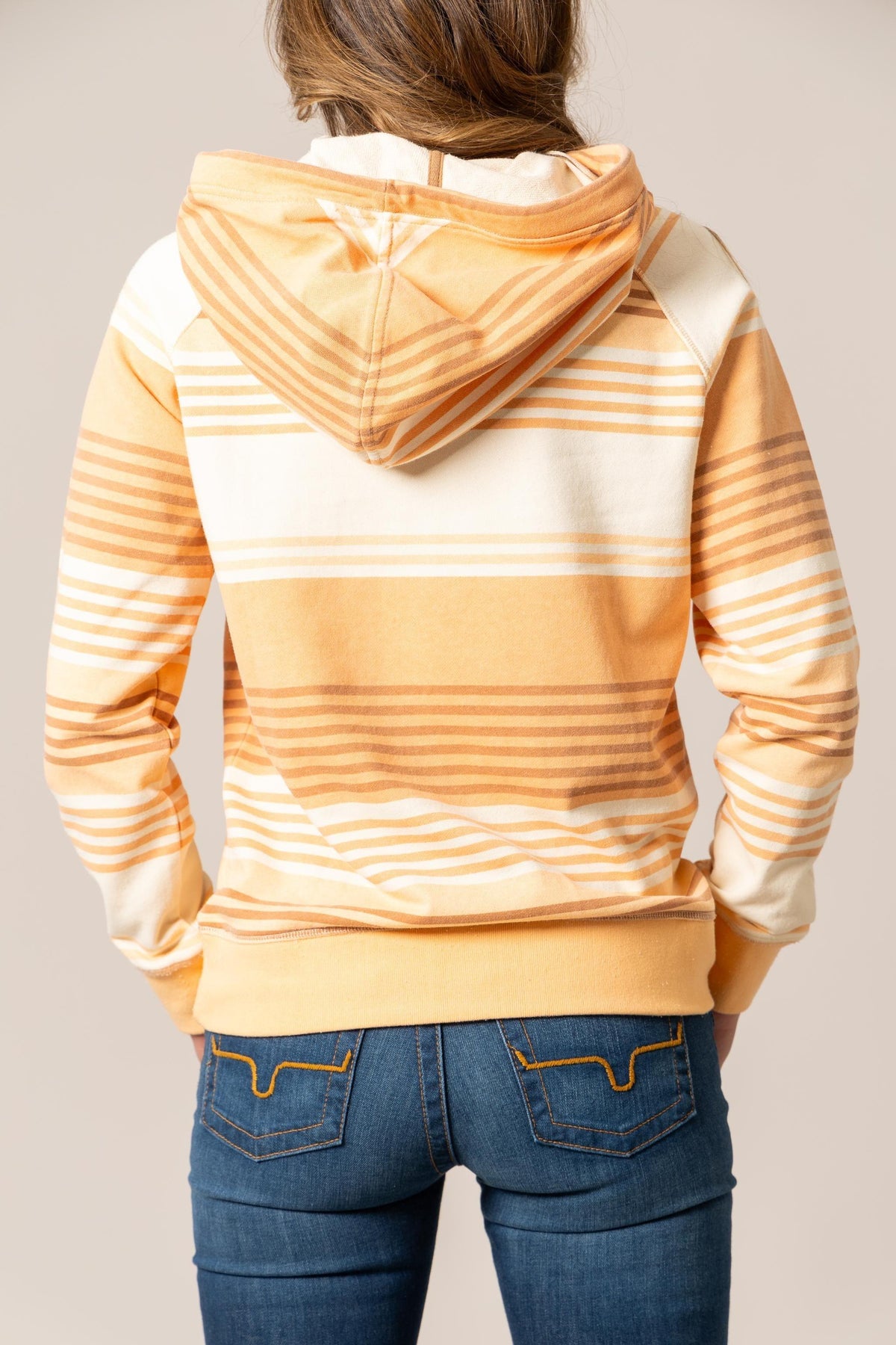 Kimes Ranch Golinda Pullover Hoodie in Orange, back view, with horizontal stripes and a solid hood