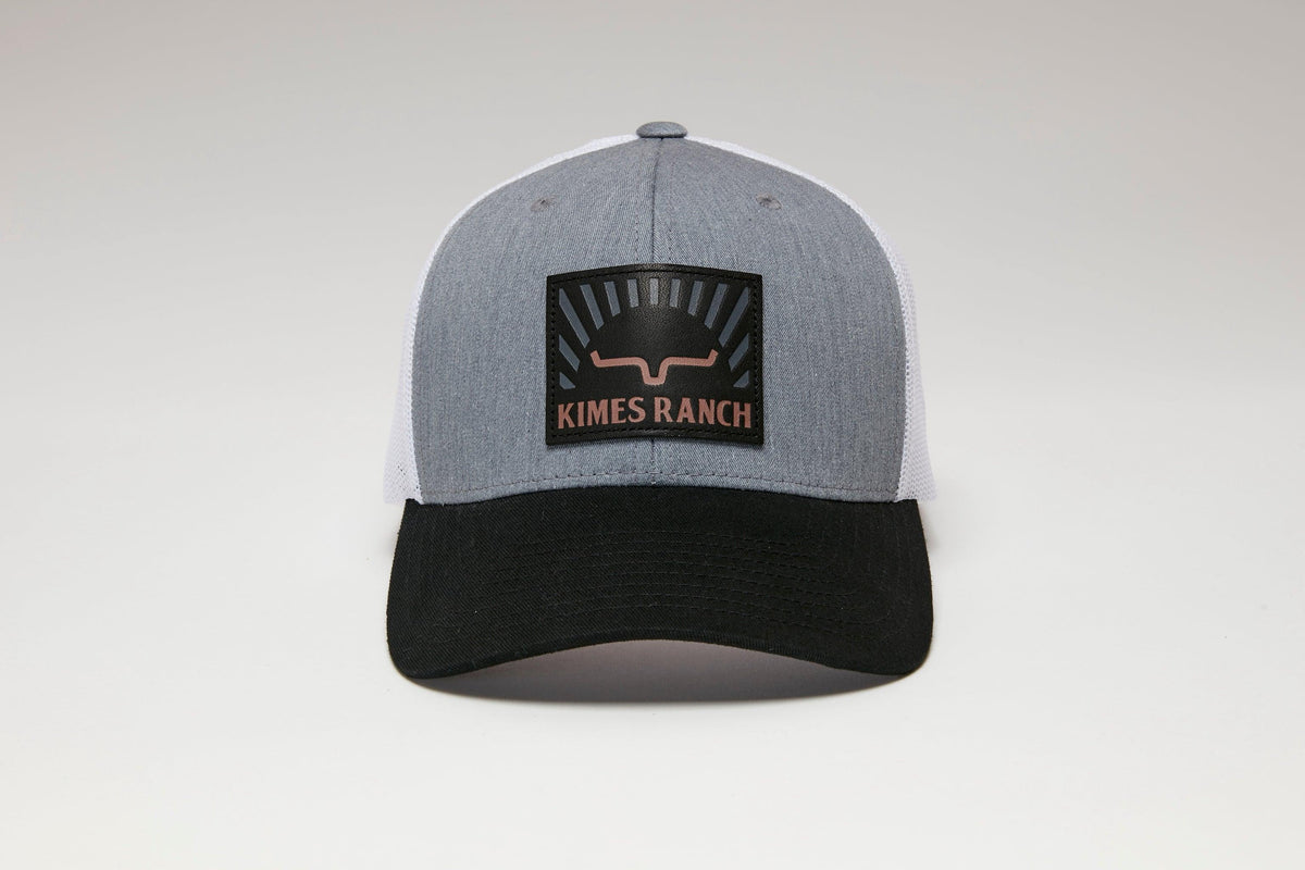Kimes Ranch Good Day Trucker Hat in Charcoal Heather with a black brim and the Kimes Ranch logo patch on the front