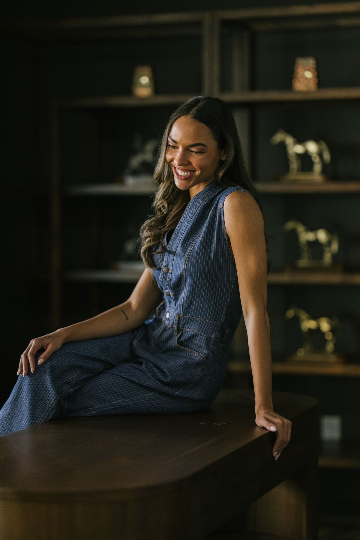 Kimes Ranch Hadley Jumpsuit in Mini Stripe, side view, with a sleeveless design and front button closure