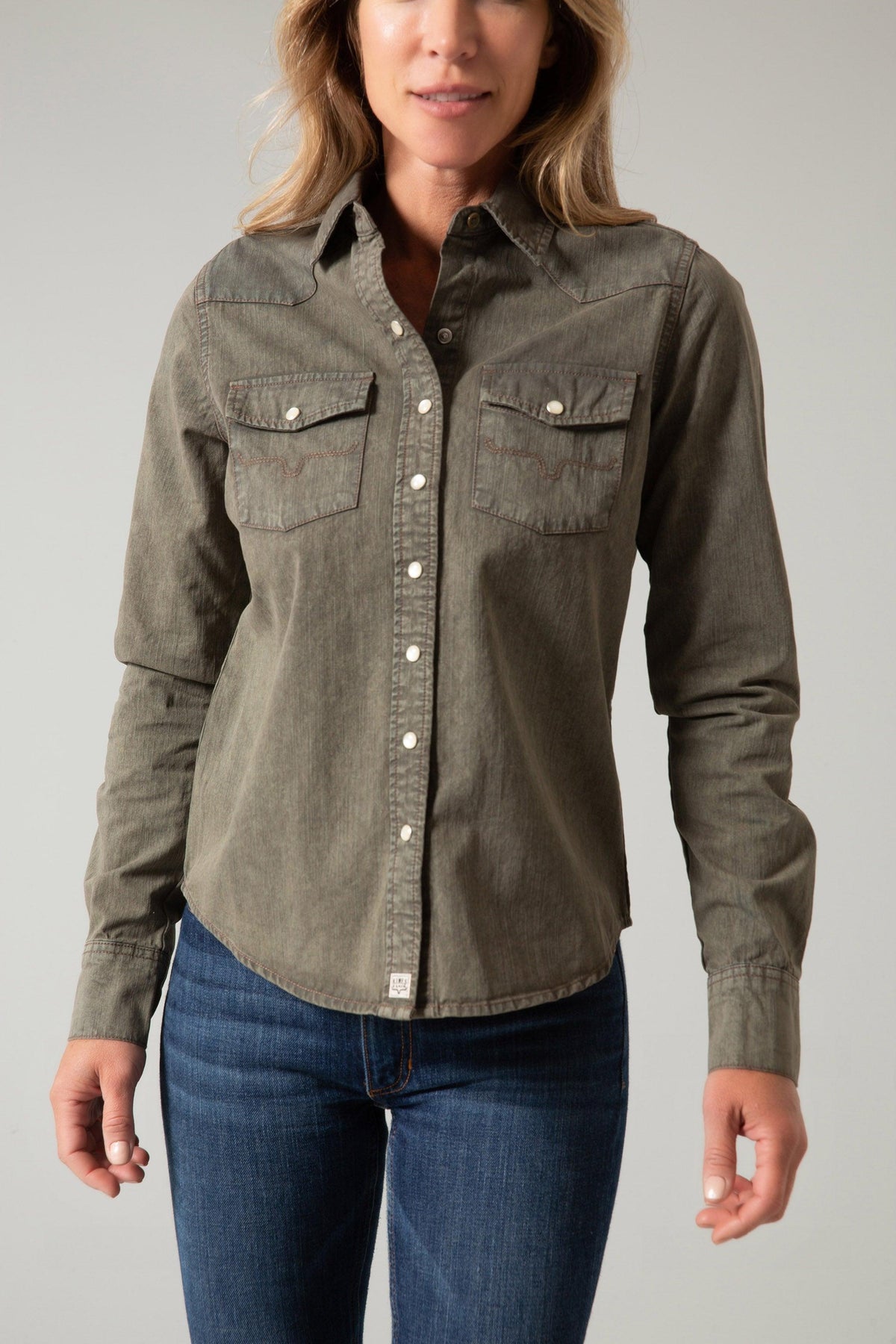 Kimes Ranch Kaycee Denim Top in OD Army with long sleeves, snap buttons, and two chest pockets with stitching