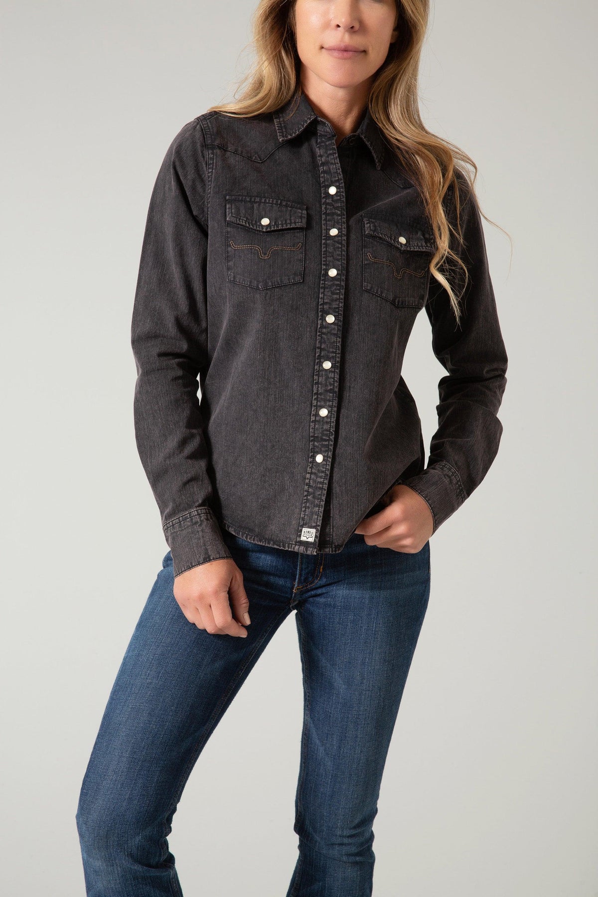 Kimes Ranch Kaycee Denim Top in Od Black Denim with a western yoke and two chest pockets with contrasting stitching