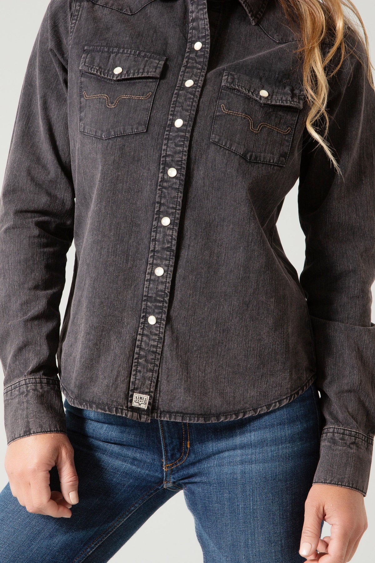 Kimes Ranch Kaycee Denim Top in Od Black Denim with contrast stitching on chest pockets and white buttons
