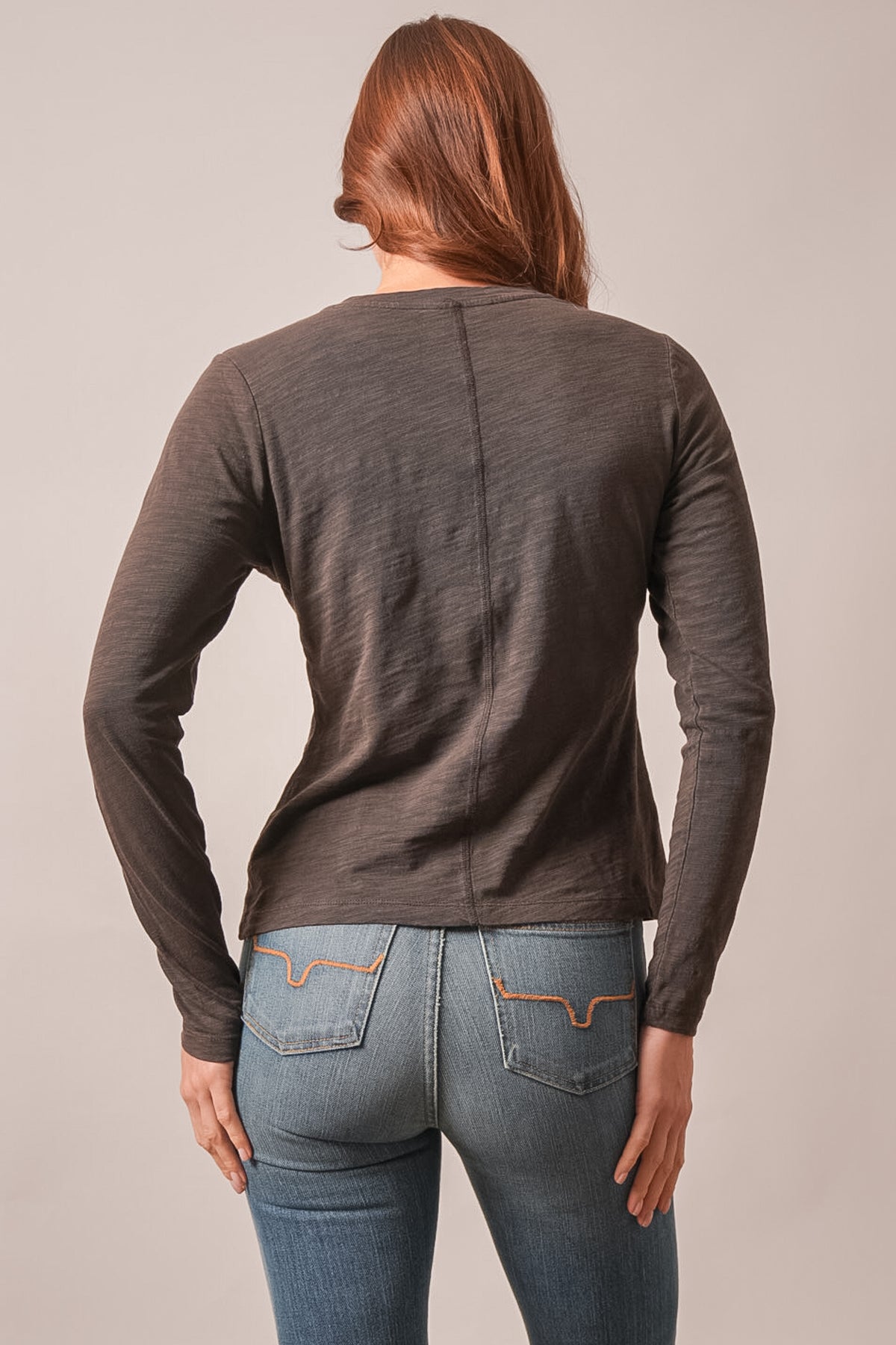 Kimes Ranch Ainsley long sleeve top in Espresso, back view showing a center seam