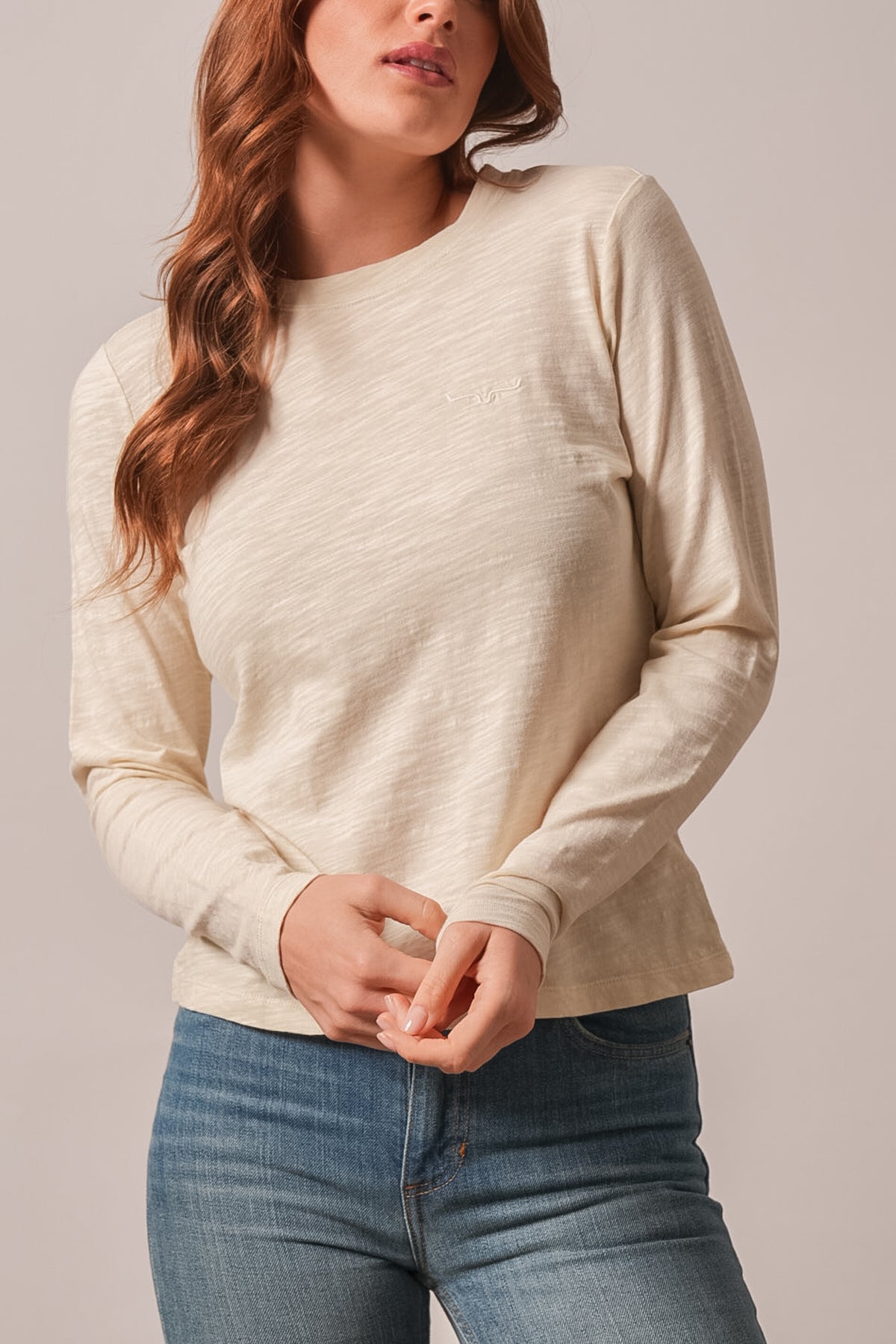 Kimes Ranch Ainsley long-sleeve top in Natural with ribbed cuffs and Kimes Ranch logo on chest