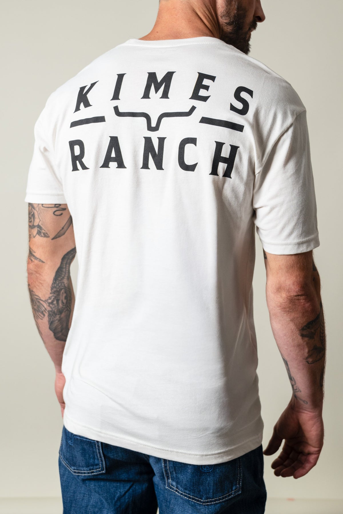 Kimes Ranch Back Branded short sleeve shirt in Bone with black KIMES RANCH logo and steer mark on back