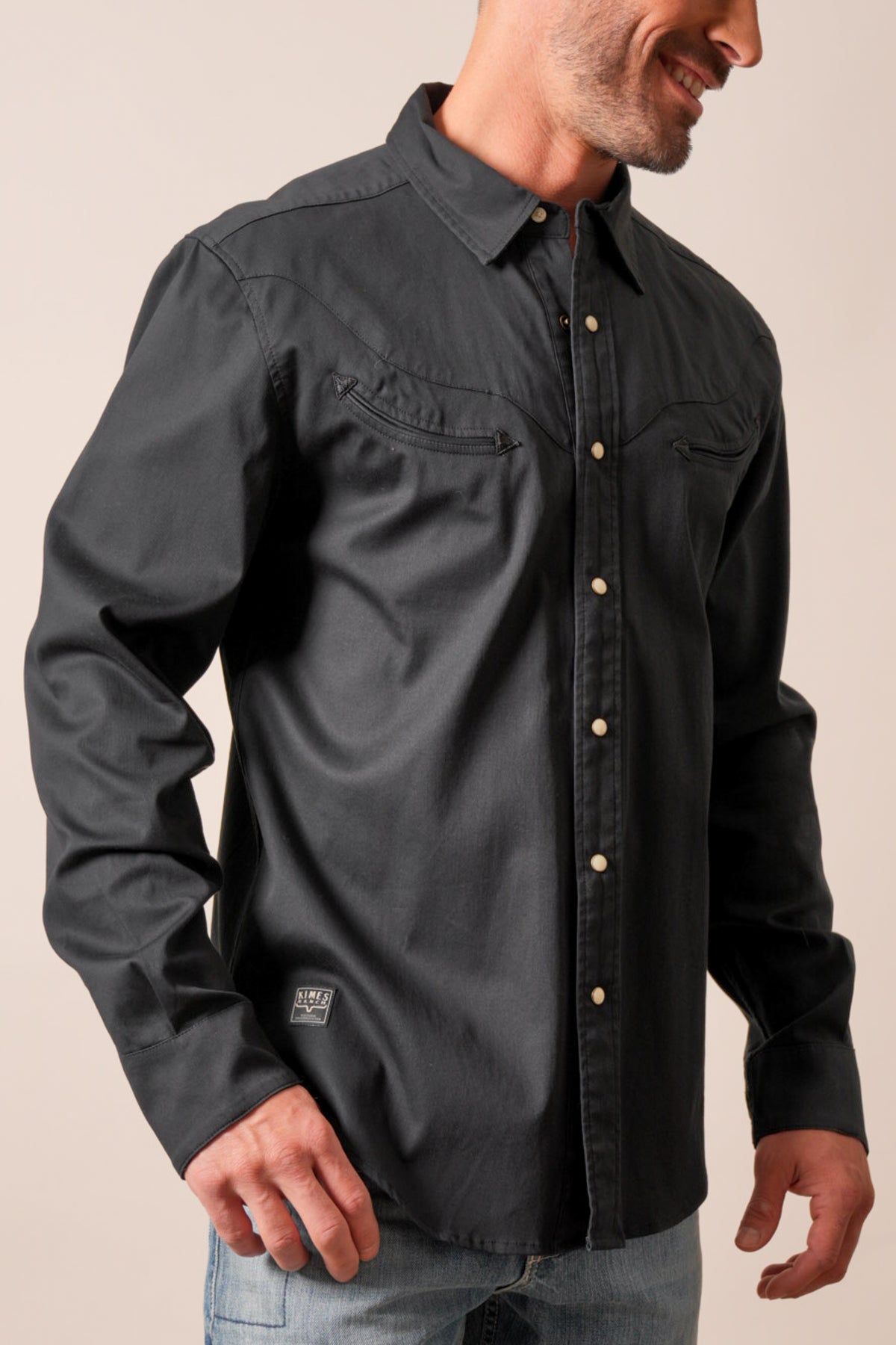 Kimes Ranch Baffert long sleeve dress shirt in black with dual chest pockets and Kimes Ranch logo