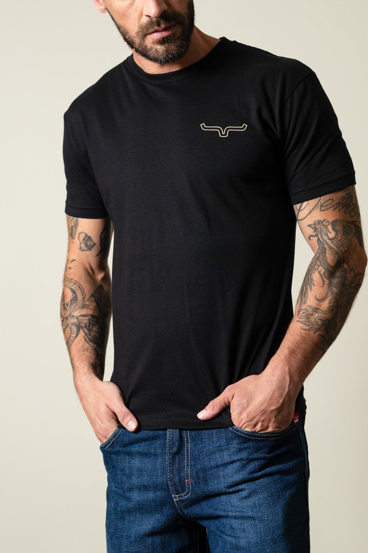 Kimes Ranch Camo Back short sleeve black t-shirt featuring a small embroidered Kimes Ranch logo on the chest