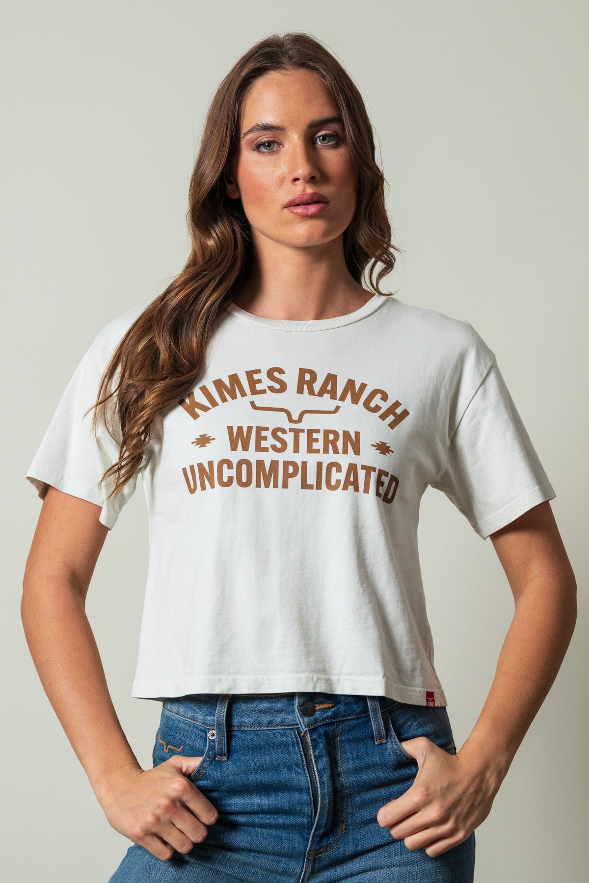 Kimes Ranch Cavell short sleeve shirt in Natural, featuring arched text KIMES RANCH WESTERN UNCOMPLICATED in brown