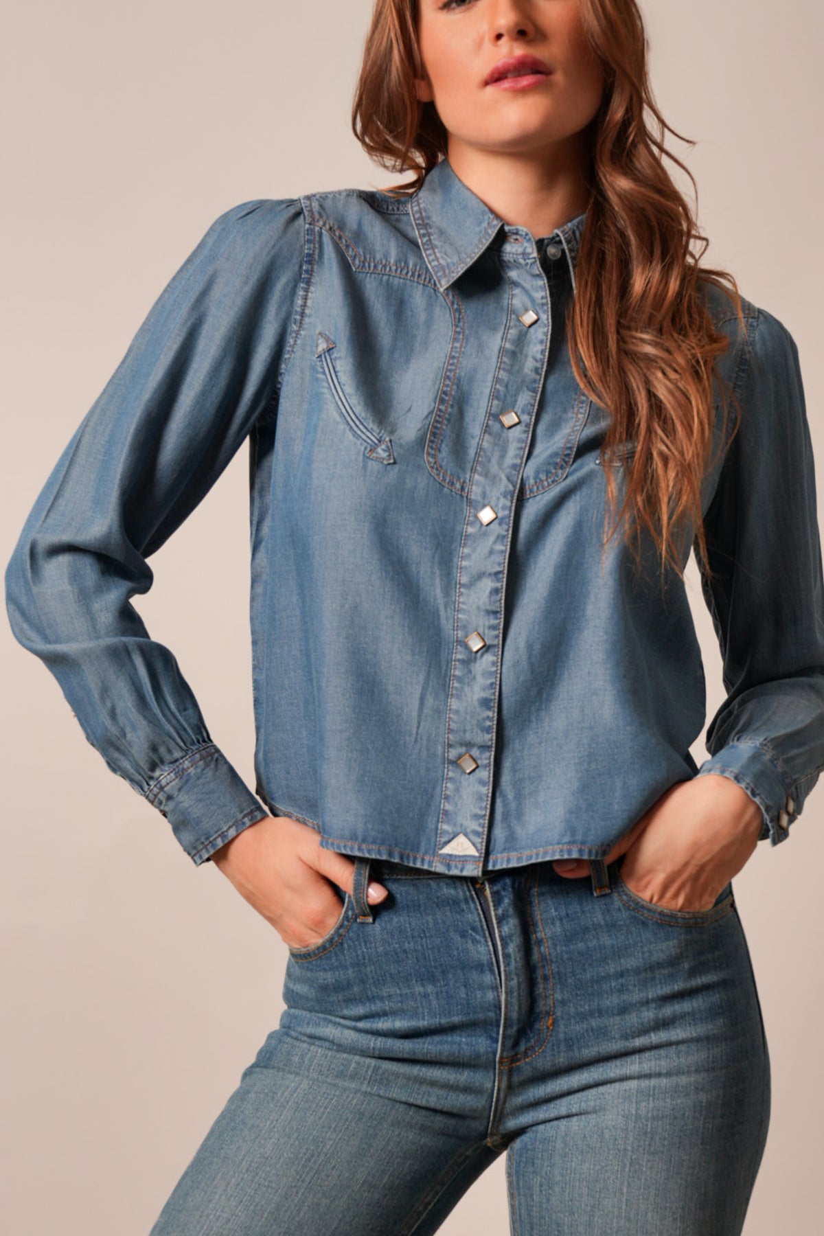 Kimes Ranch Cece women's long sleeve denim top in indigo with two chest pockets and contrast stitching