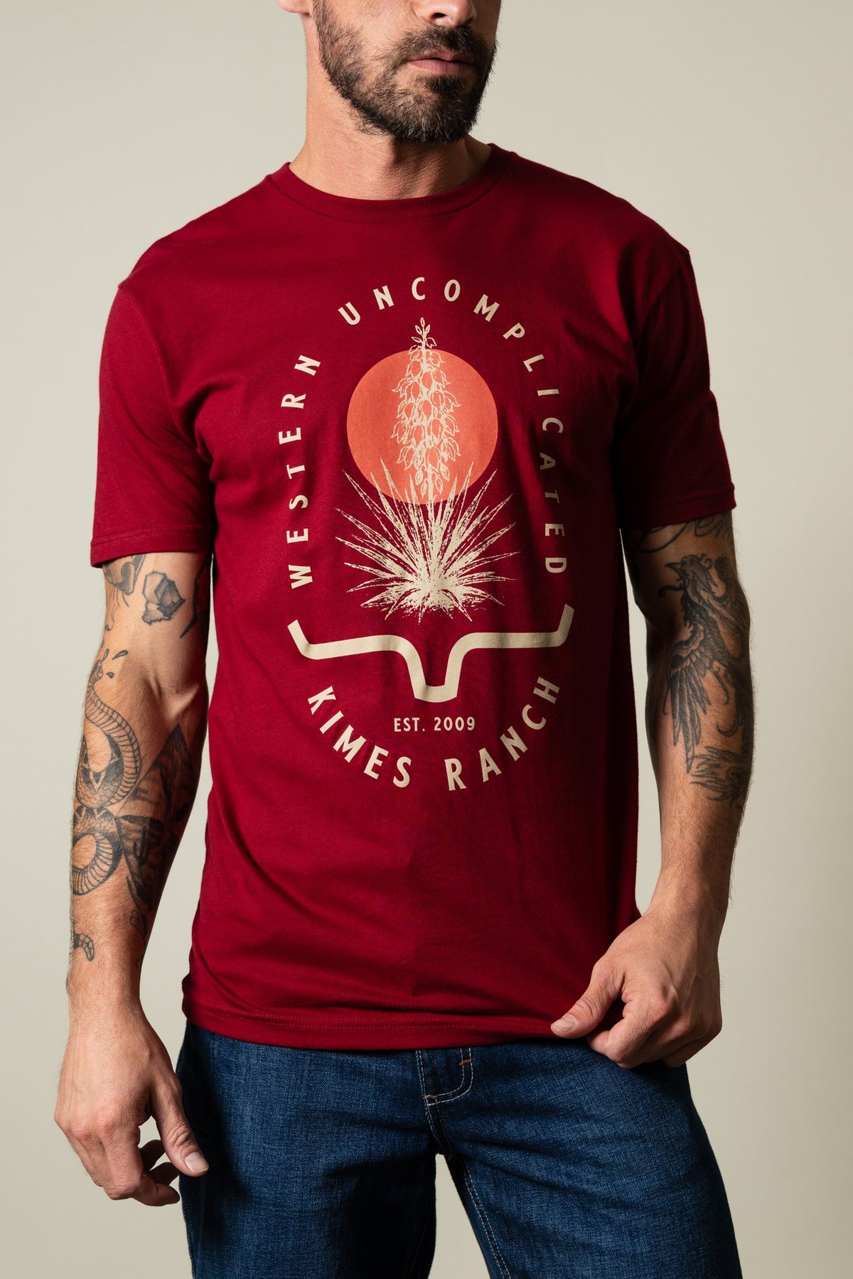 Kimes Ranch Drought Resistant cardinal shirt with yucca, sun, and steer head print