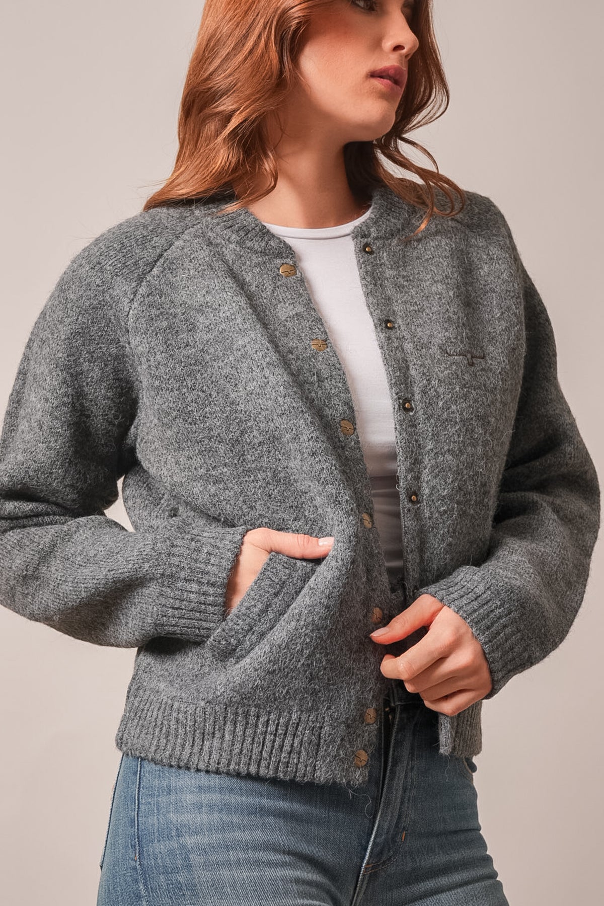 Kimes Ranch Ennis charcoal sweatshirt with long sleeves, button front, kangaroo pocket, ribbed cuffs and Kimes Ranch logo
