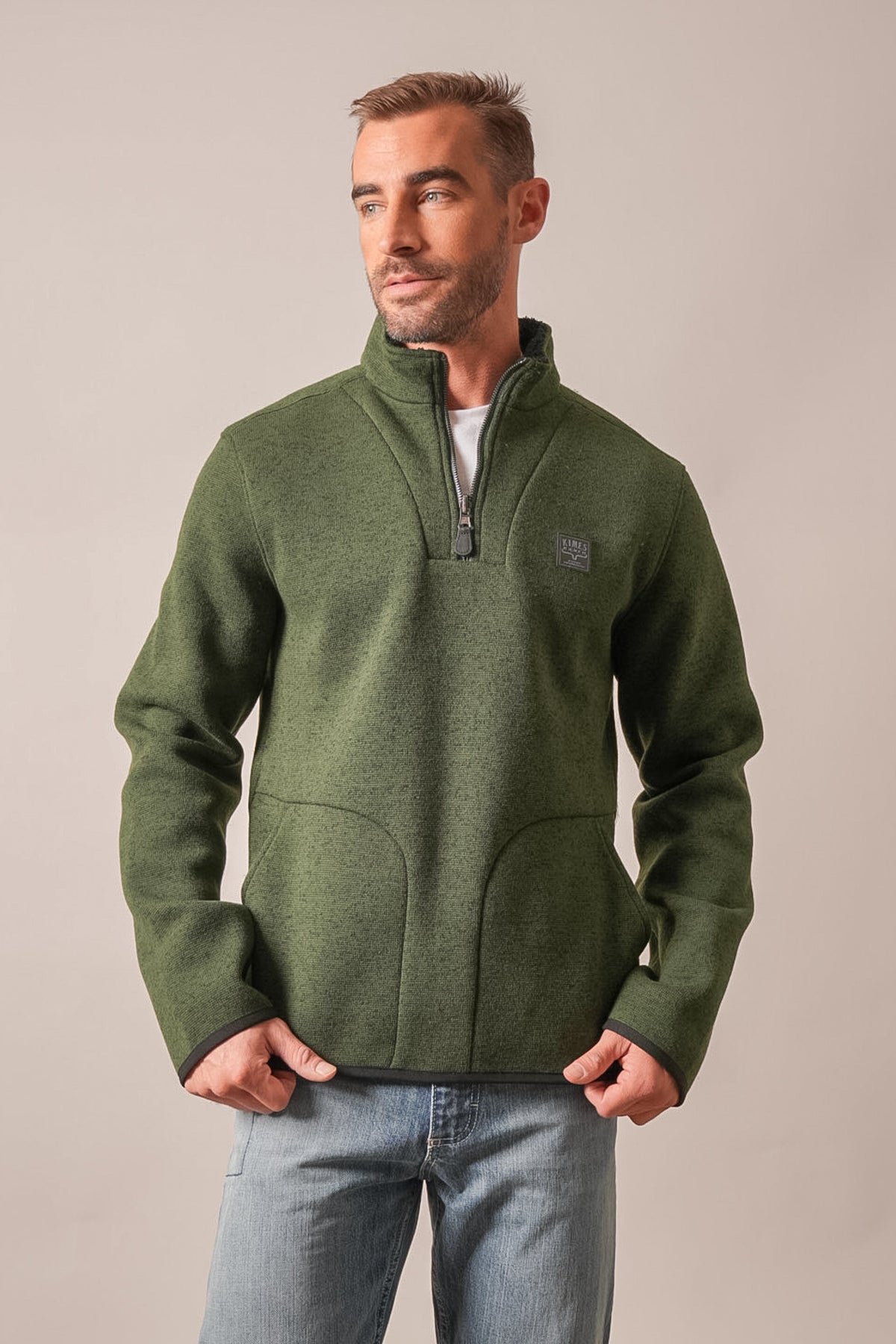 Kimes Ranch Fontana sweatshirt in Forest green, featuring a quarter zip, front pockets and the Kimes Ranch logo