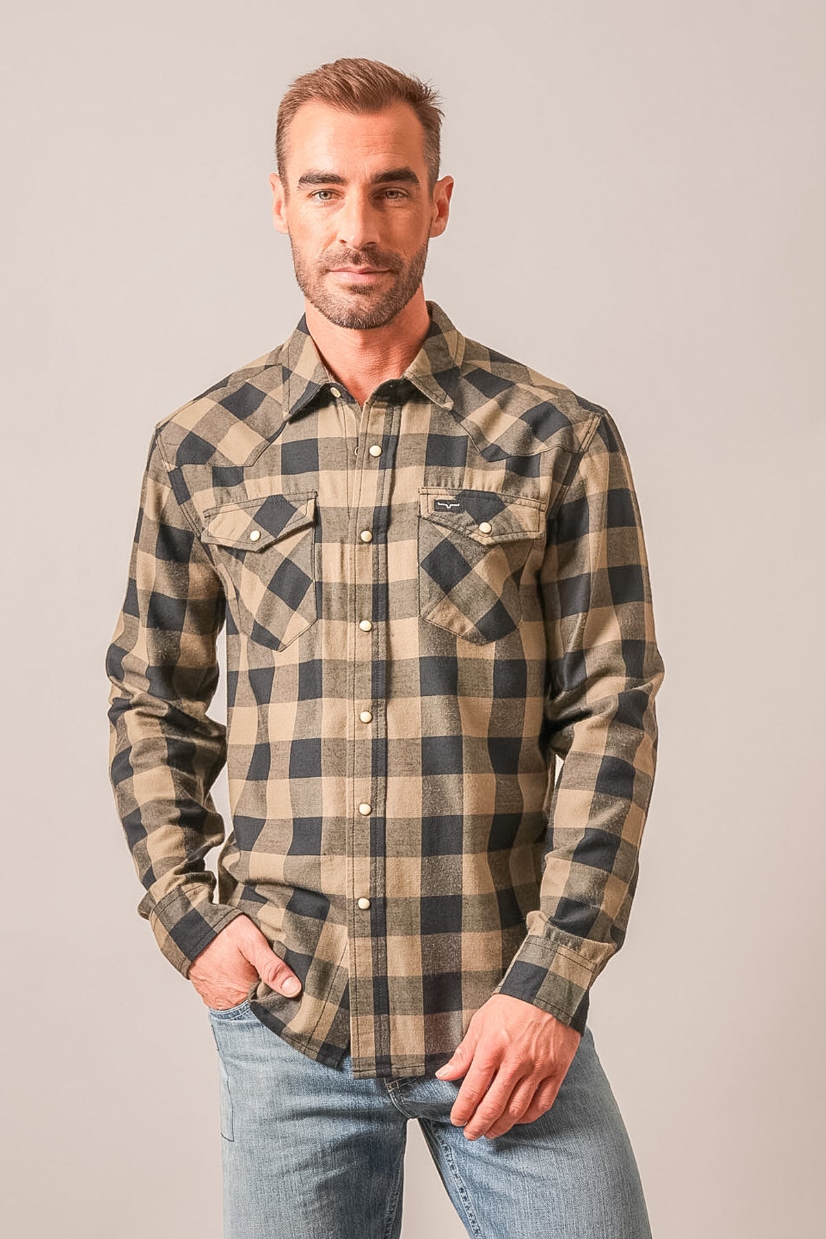 Kimes Ranch Jonez long sleeve western shirt in Army Green with black plaid pattern, snap-front closure, and two chest pockets