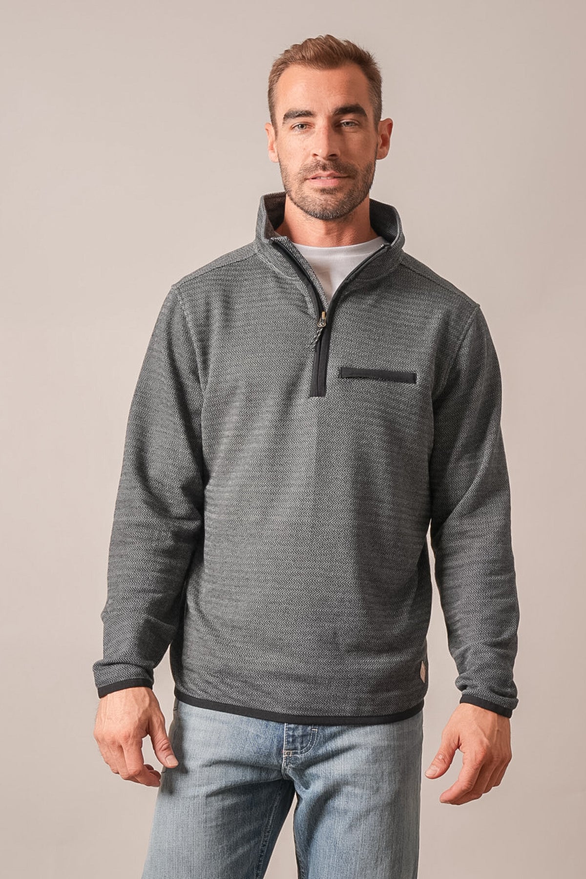 Kimes Ranch Lambert men's sweatshirt in black with half-zip, chest pocket, long sleeves, and herringbone texture