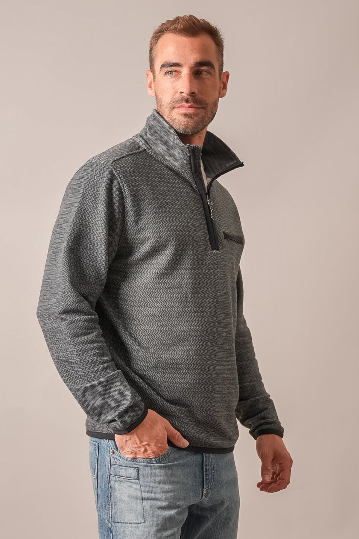 Kimes Ranch Lambert sweatshirt in black with a herringbone pattern, quarter-zip, long sleeves, and a chest pocket