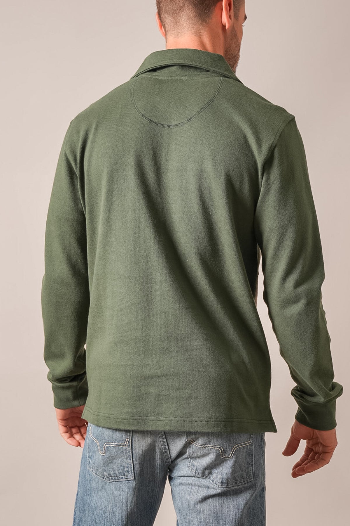 Kimes Ranch Lark long sleeve Forest polo shirt, back view with curved back yoke