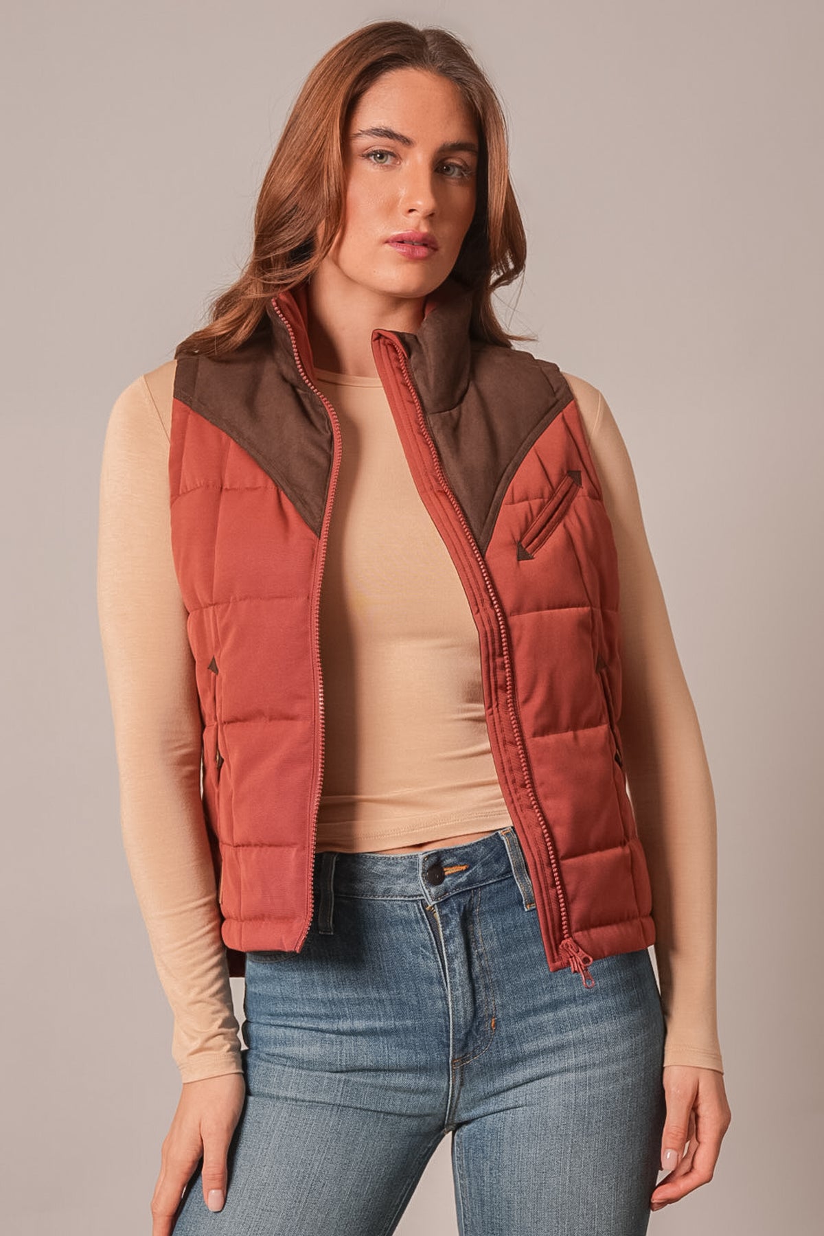 Kimes Ranch Lenora vest in burnt red with brown stand collar, full front zipper, two front pockets and Kimes Ranch logo
