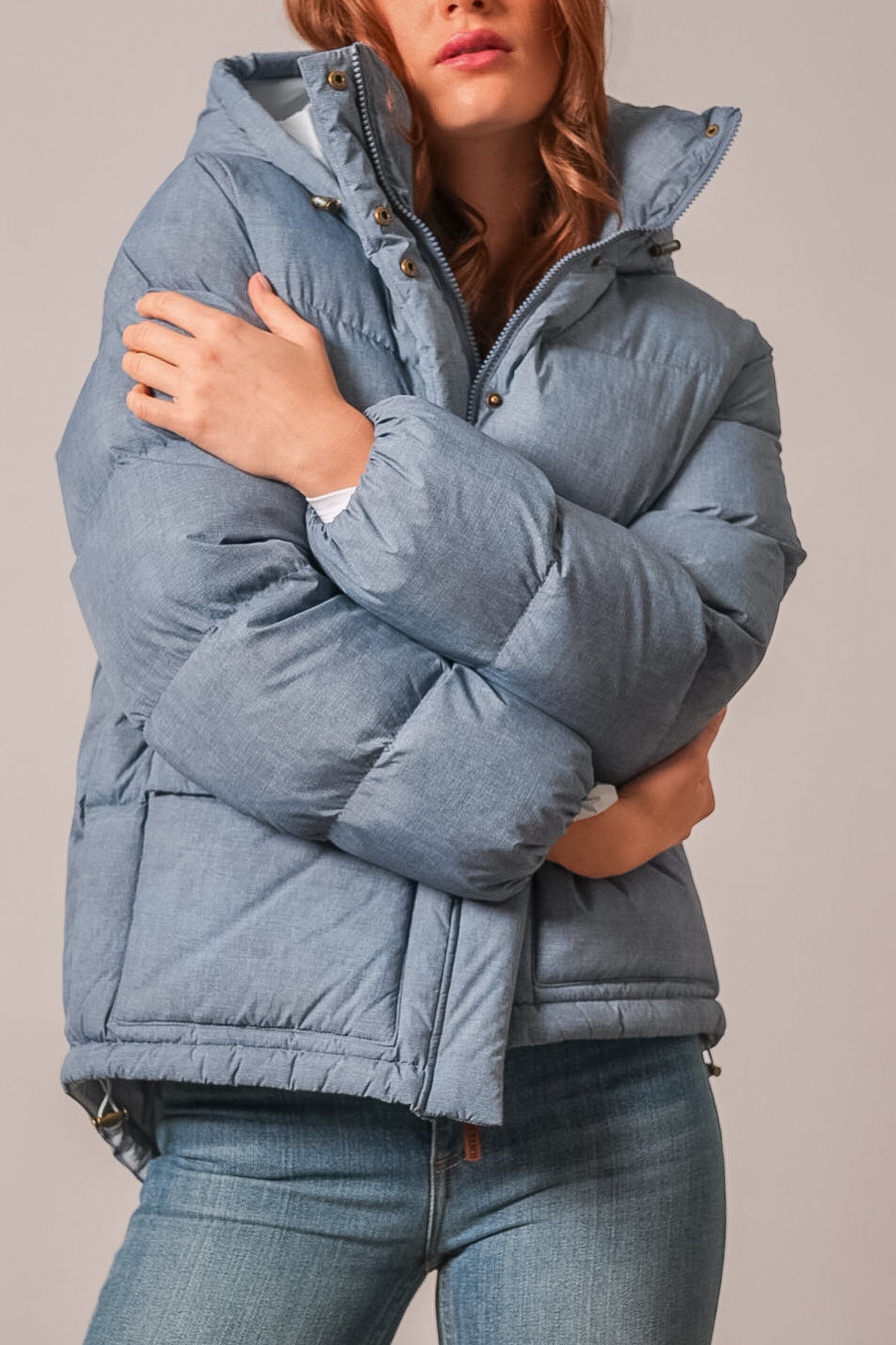 Kimes Ranch Letty jacket, women's quilted puffer with hood, snap-front closure, and long sleeves in Faded Denim