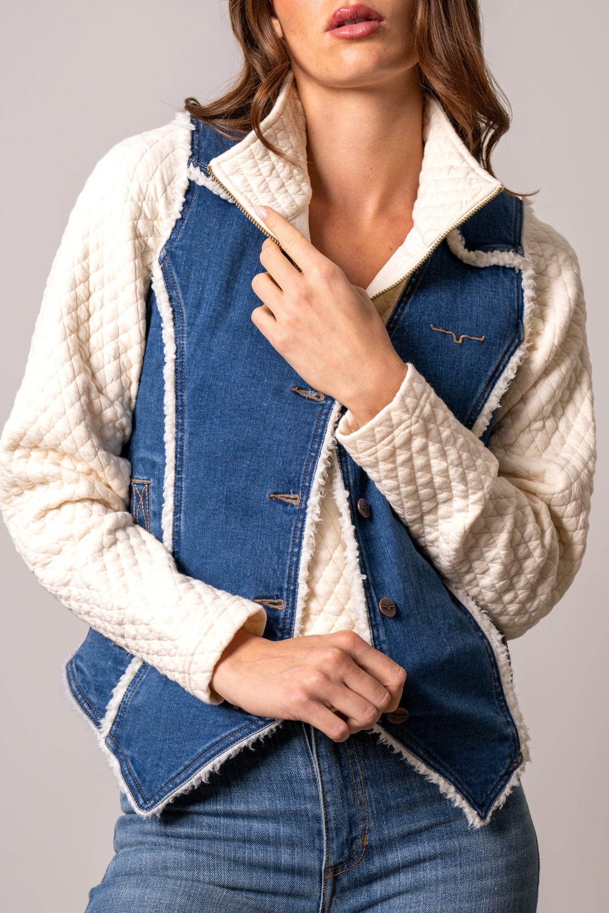 Kimes Ranch Loni vest in dark wash denim with white quilted sleeves and faux shearling trim