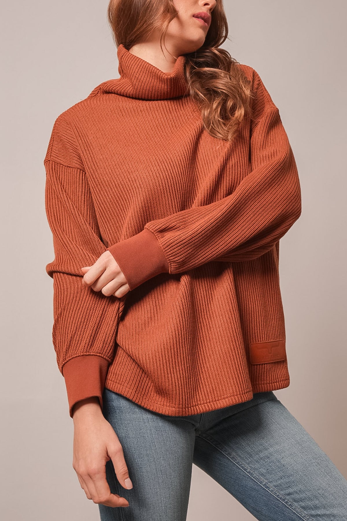 Kimes Ranch Maren sweatshirt in burnt red, long sleeve, cowl neck, waffle knit, leather logo patch at hem