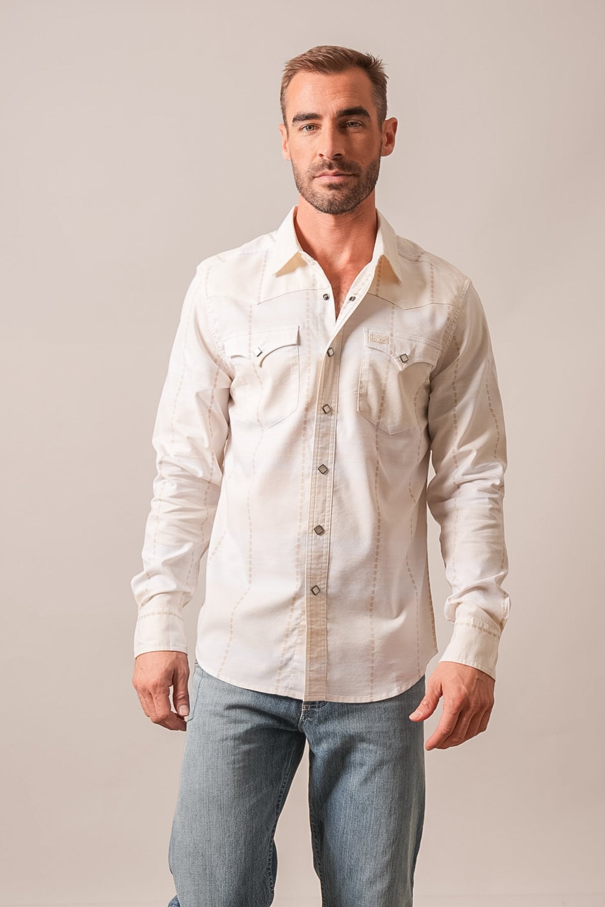Kimes Ranch Mitch dress shirt in natural with long sleeves, dual chest pockets, western yoke, and embroidered detailing