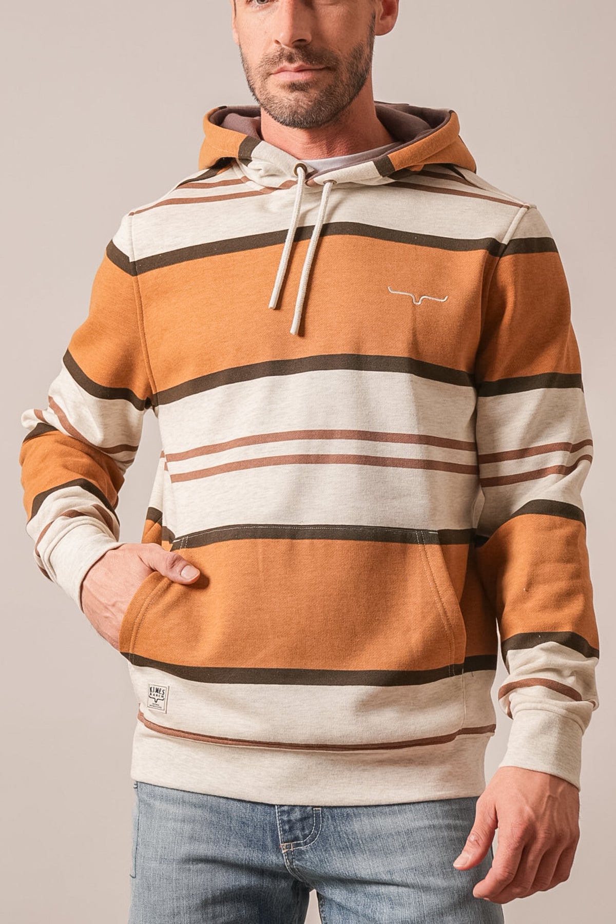Kimes Ranch Owen hoodie in natural with horizontal stripes, kangaroo pocket, and embroidered Kimes Ranch logo on chest