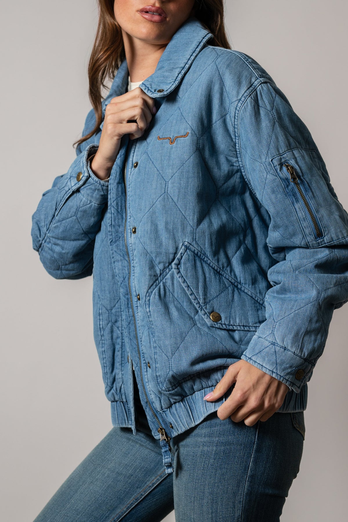 Kimes Ranch Phoeby jacket in indigo denim with quilted stitching, zip closure, and front pocket