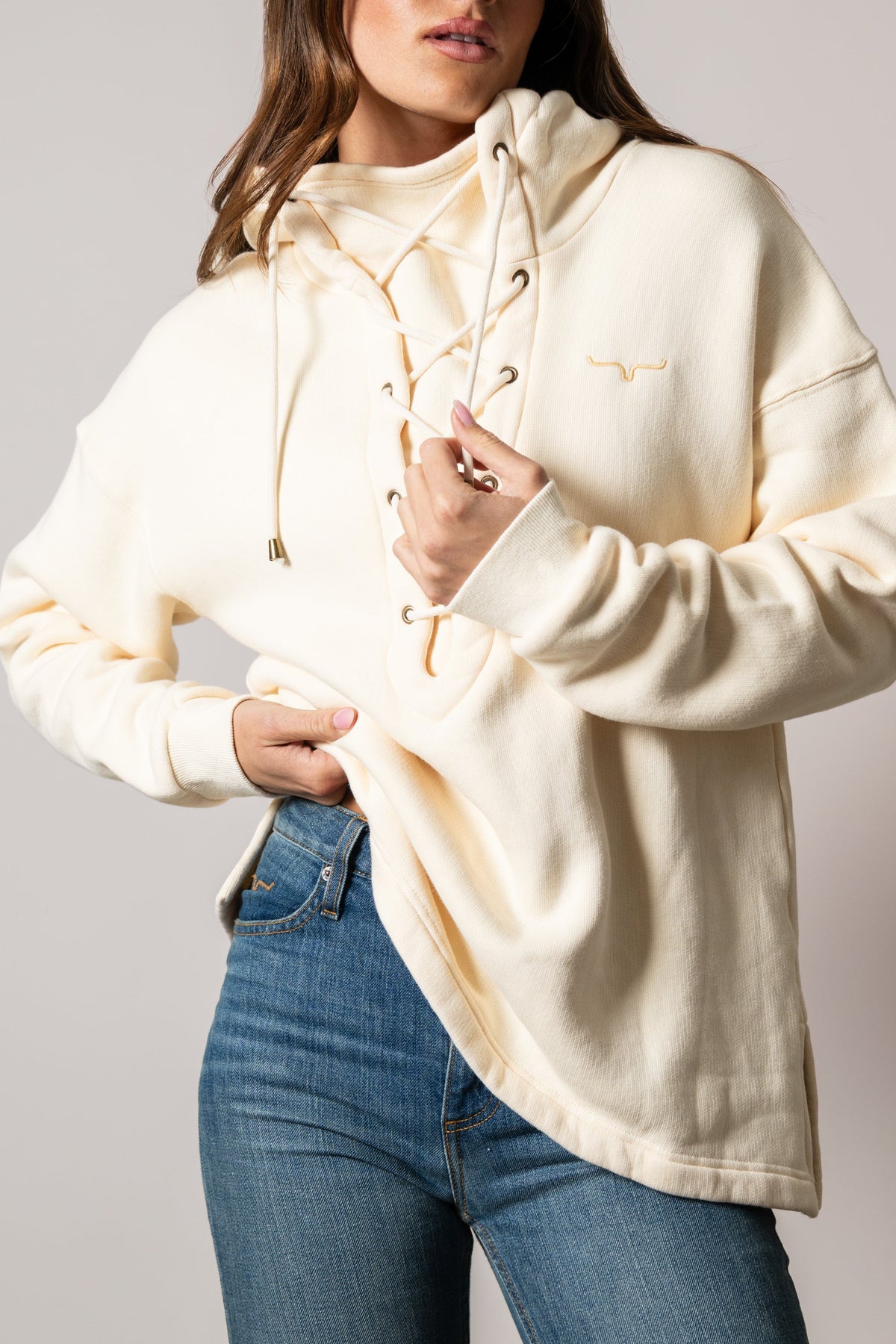 Kimes Ranch Pippi hoodie in Natural with long sleeves, front lace-up detail, kangaroo pocket, and embroidered logo