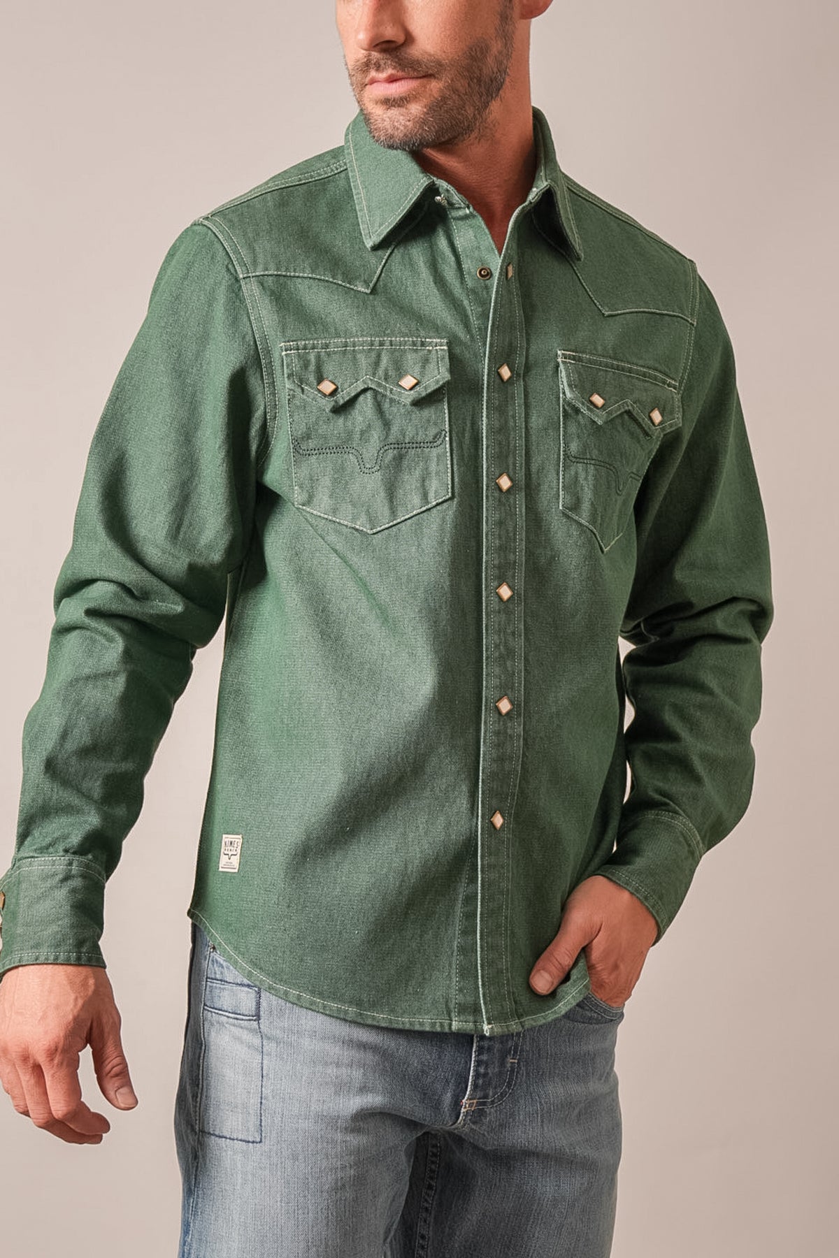 Kimes Ranch Roscoe Forest shirt with pointed yoke, two chest pockets, diamond studs, and logo patch