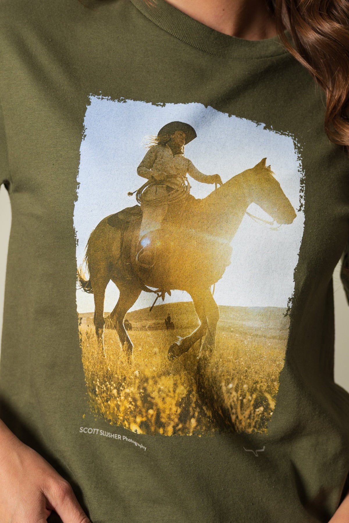Kimes Ranch SS Riding Sunshine military green shirt with graphic of person riding horse, SCOTT SLUSHER Photography