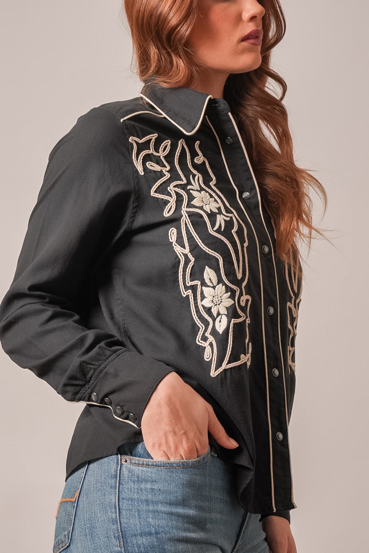 Kimes Ranch Stevie black long sleeve top with beige floral embroidery and contrast stitching
