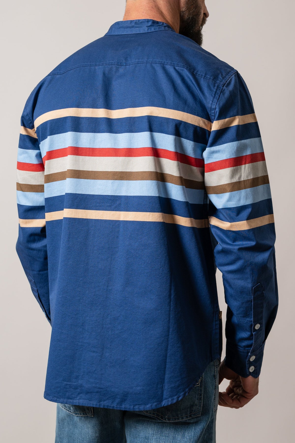 Kimes Ranch ZT Caliber dress shirt, dark blue back with multi-colored horizontal stripes and long sleeves