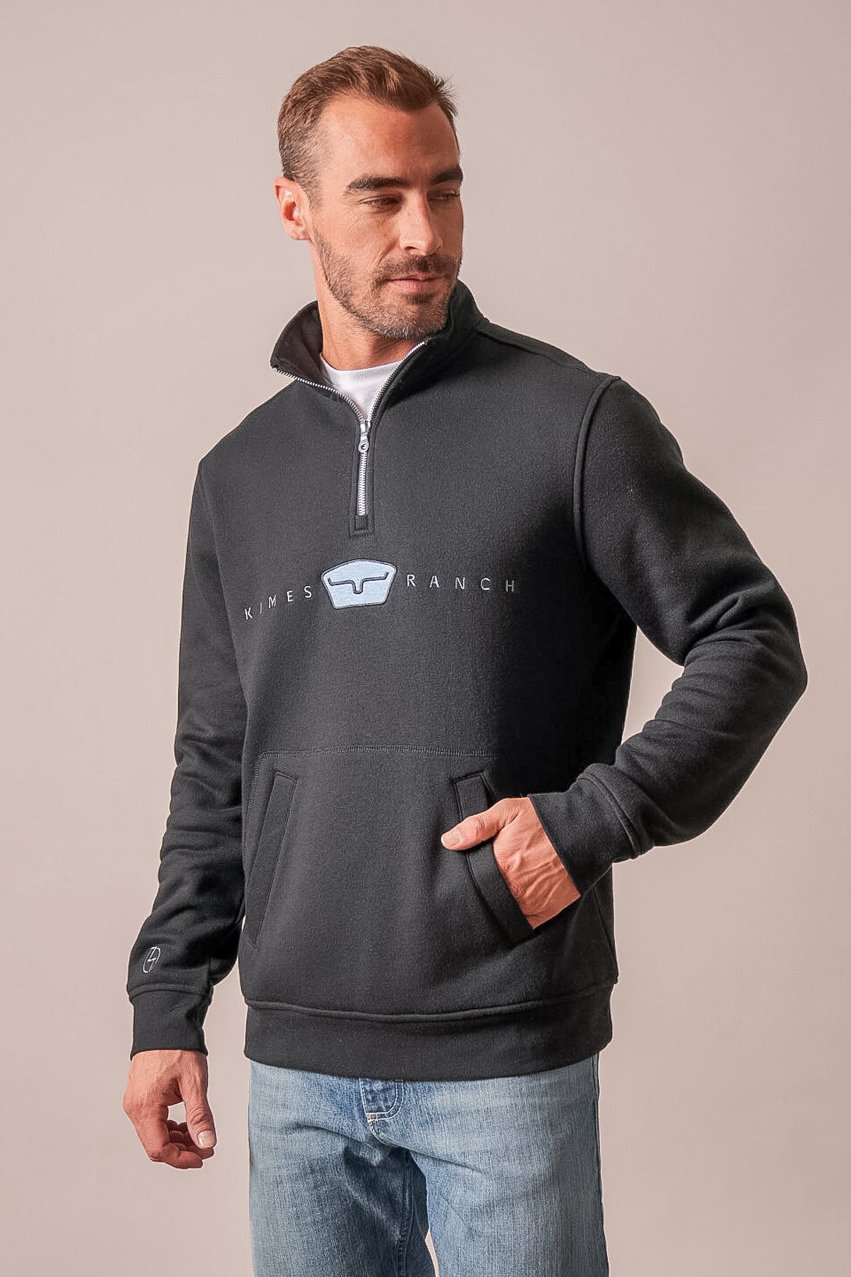 Kimes Ranch ZT Par Three Black quarter-zip sweatshirt with long sleeves, kangaroo pockets, and Kimes Ranch logo at chest