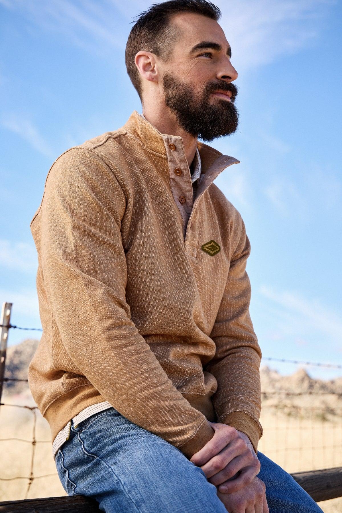 Kimes Ranch Kingswell sweatshirt in Work Wear Brown, side view, with a half-button placket and logo patch