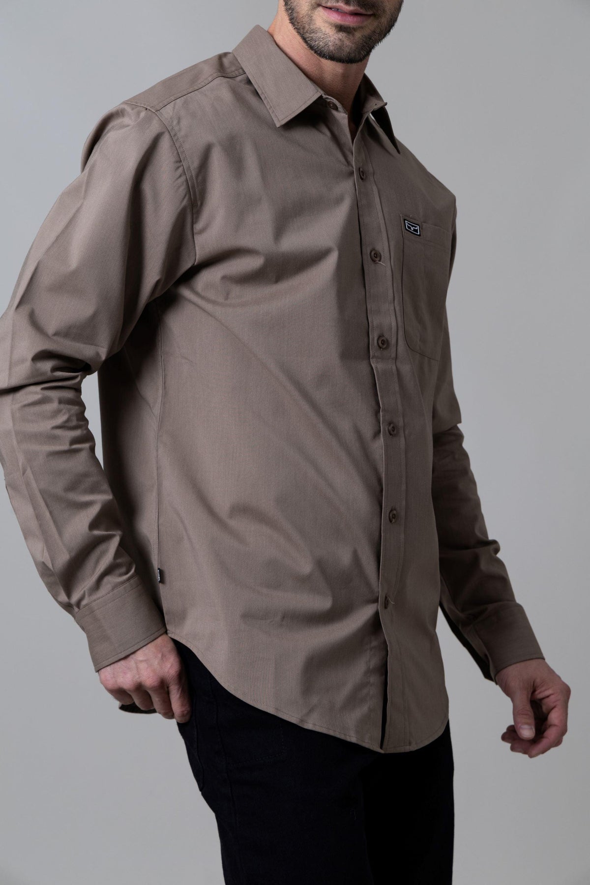 Kimes Ranch Linville Long Sleeve Dress Shirt in Taupe, side view, with a button front and chest pocket