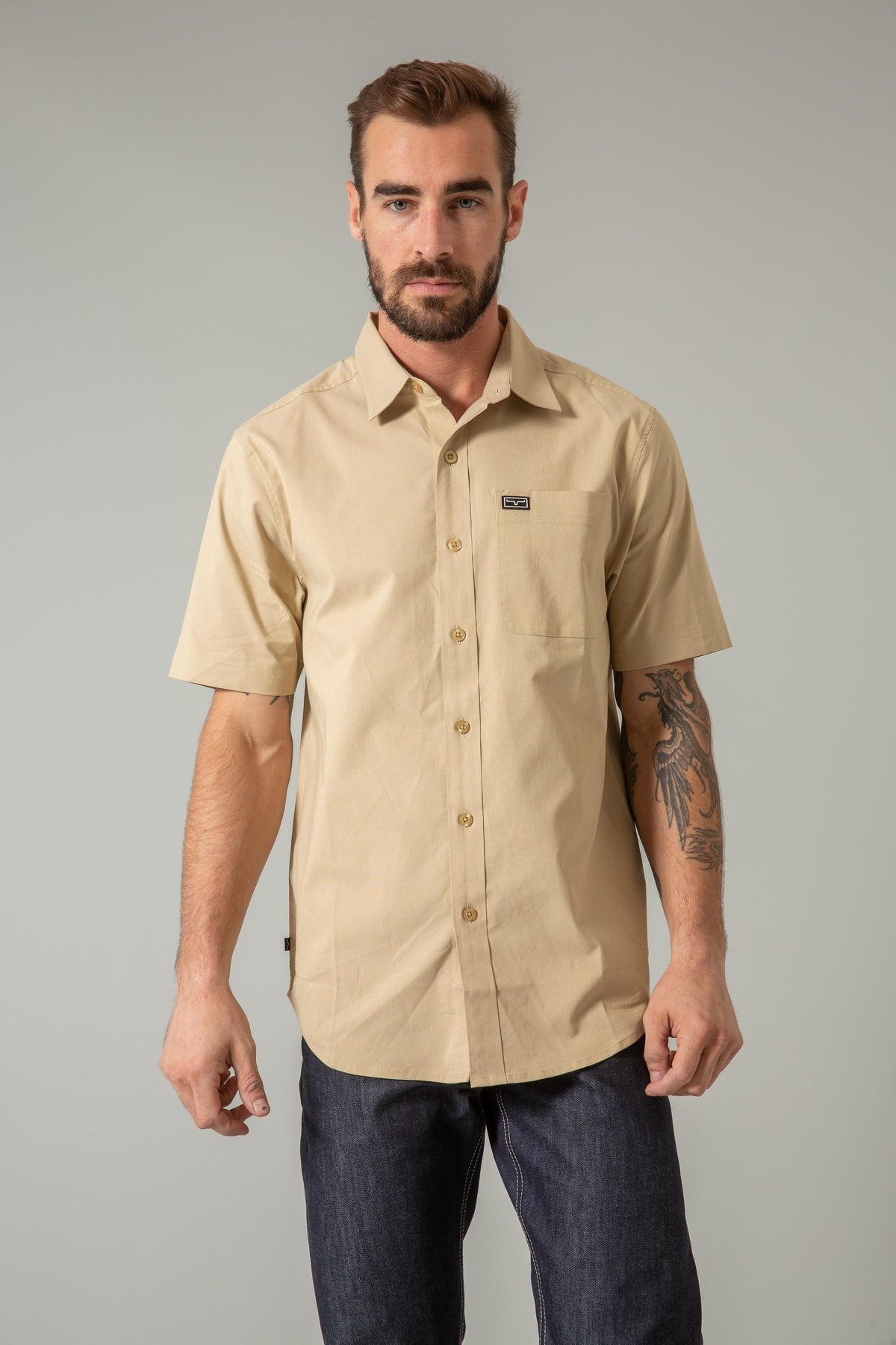 Kimes Ranch Linville Short Sleeve Dress Shirt in Khaki with a chest pocket and logo patch