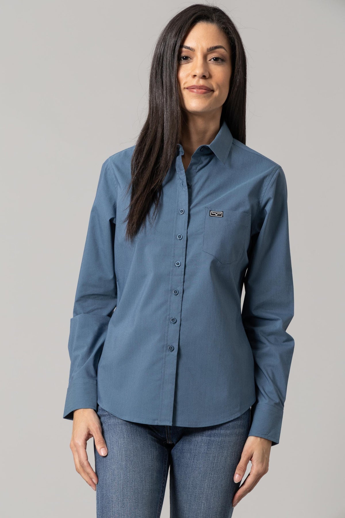 Kimes Ranch Ladies Linville top in Slate Blue with a button front and chest pocket with logo