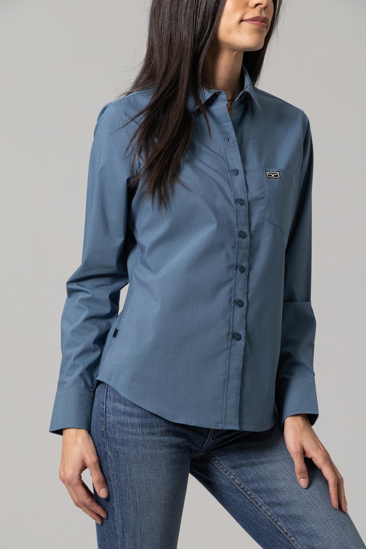 Kimes Ranch Ladies Linville top in Slate Blue with a chest pocket and logo