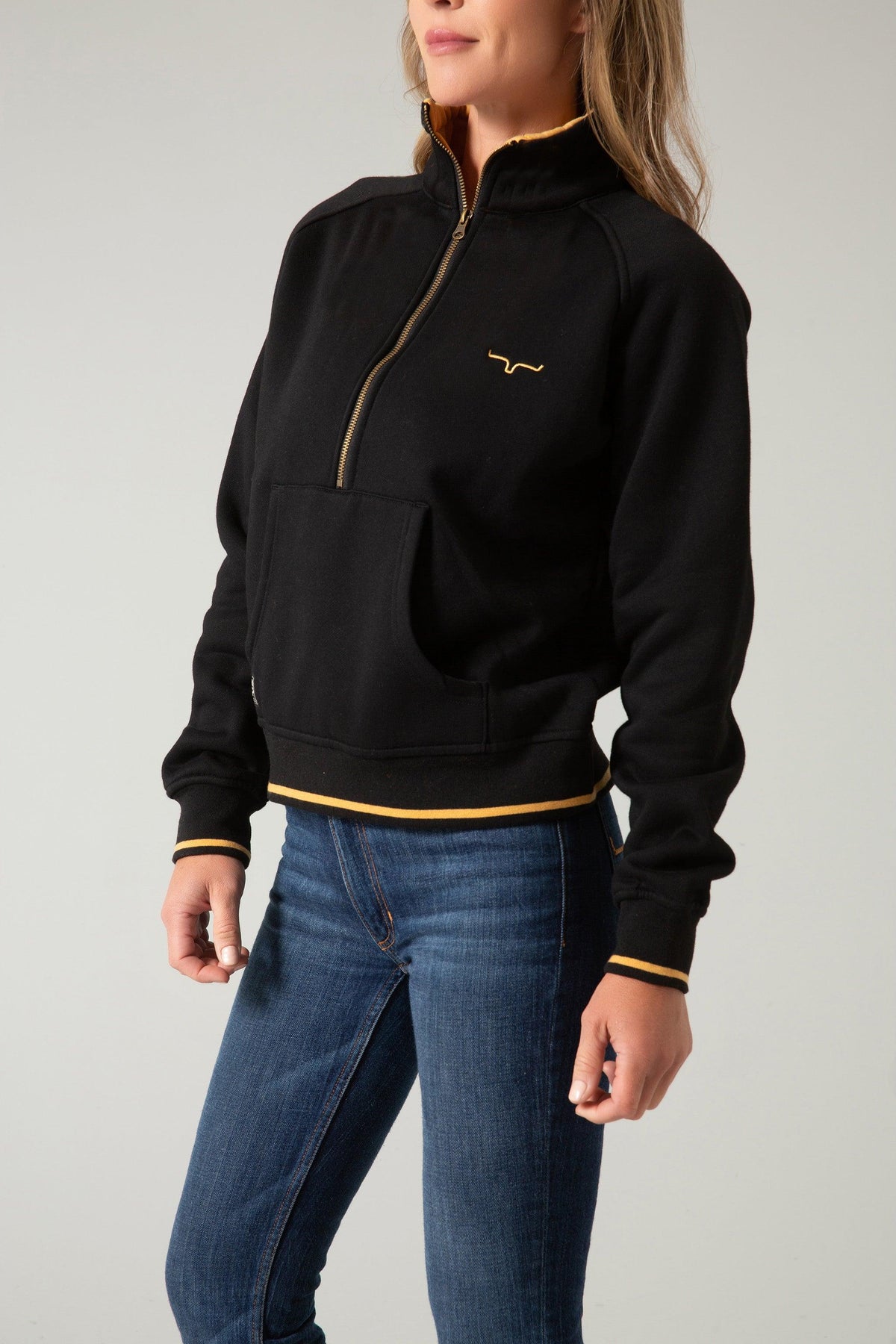 Kimes Ranch Malta Cropped Quarter Zip Sweatshirt in Black with gold zipper and logo; #color_black