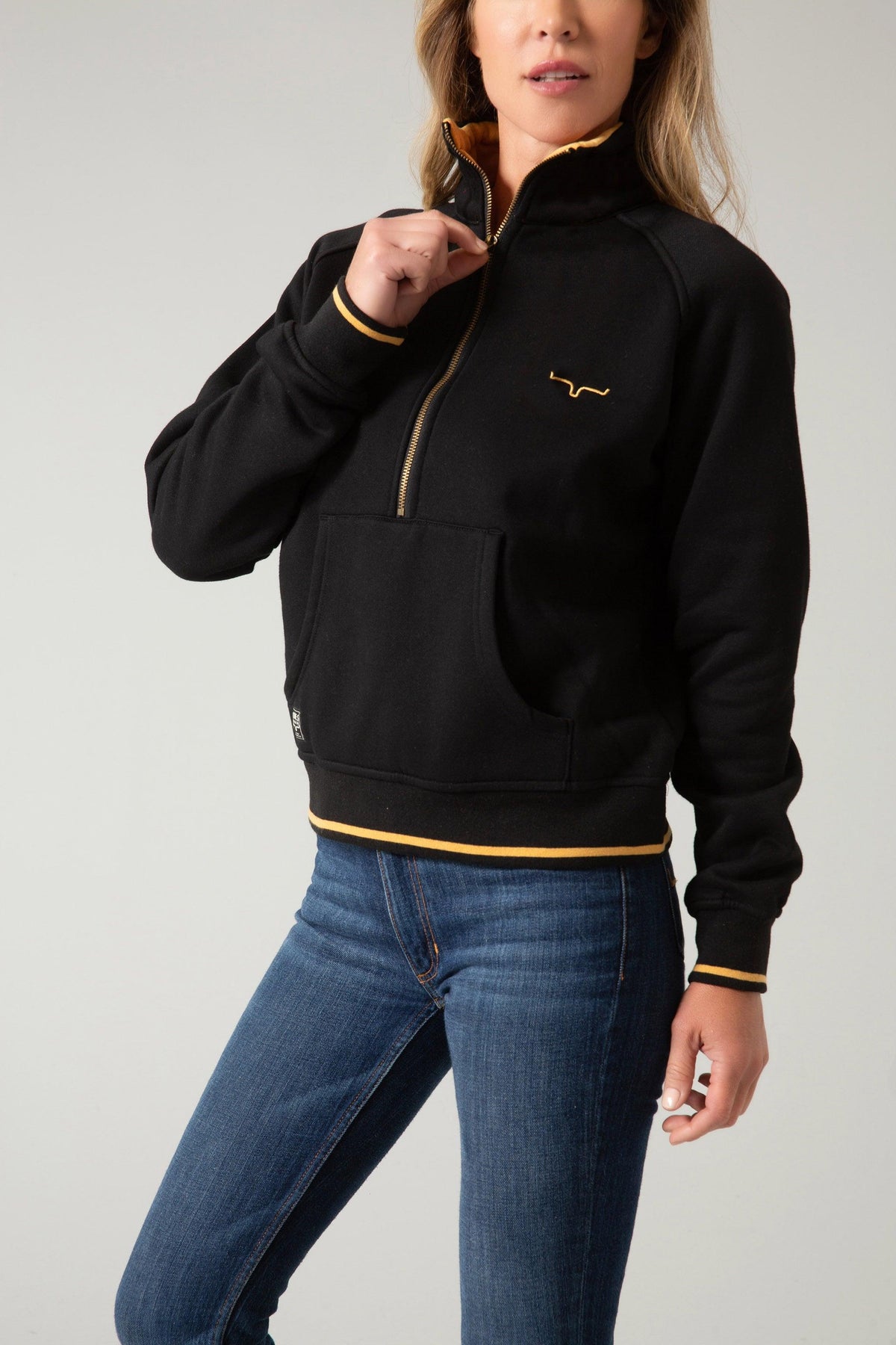 Kimes Ranch Malta Cropped Quarter Zip Sweatshirt in Black with gold zipper and logo
