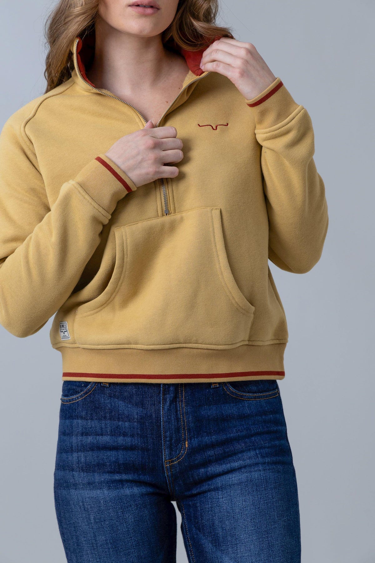 Kimes Ranch Malta Cropped Quarter Zip Sweatshirt in Maize with red Kimes Ranch logo and red trim