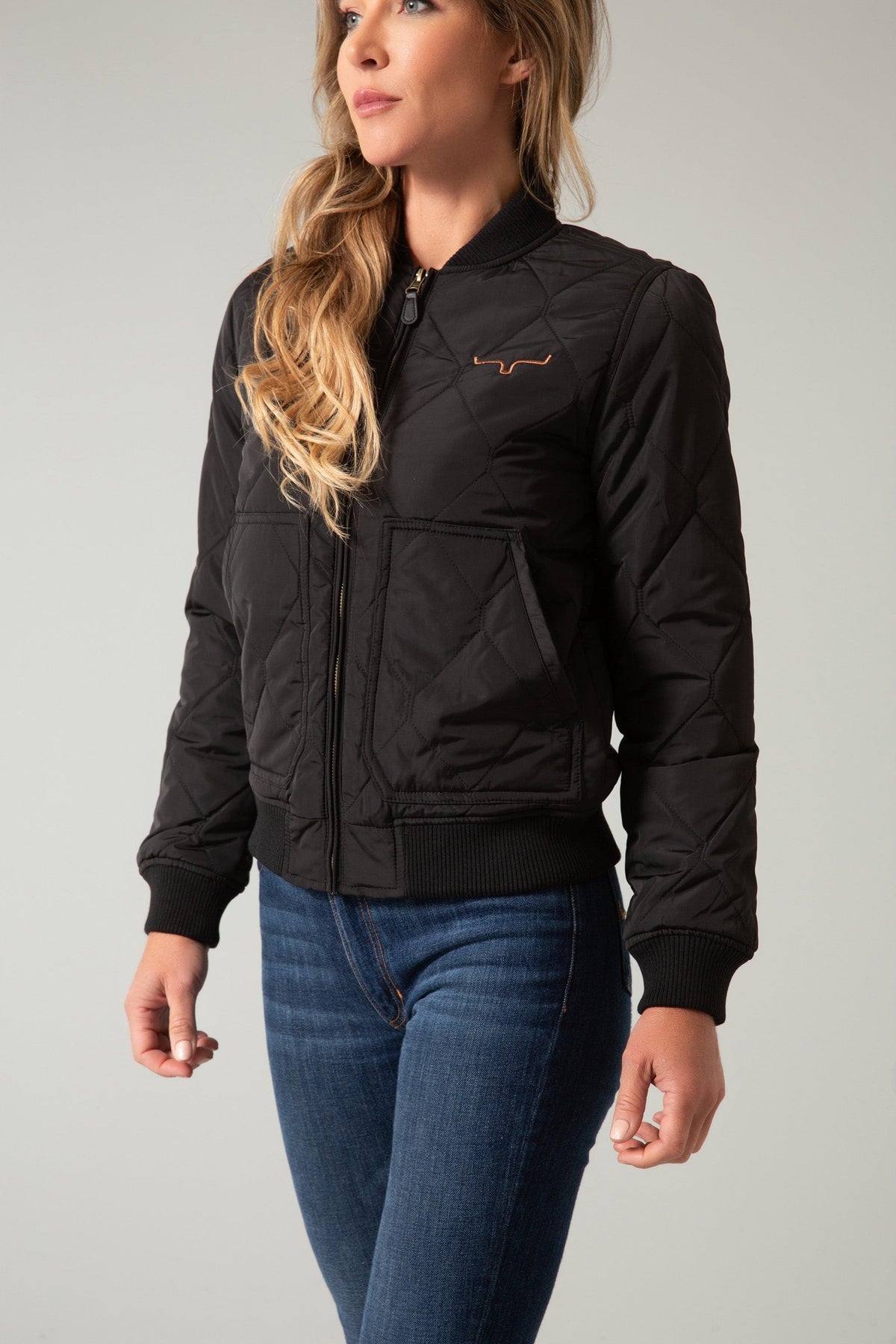 Kimes Ranch Marino Bomber Jacket in Black, side view, with diamond quilting and front pockets
