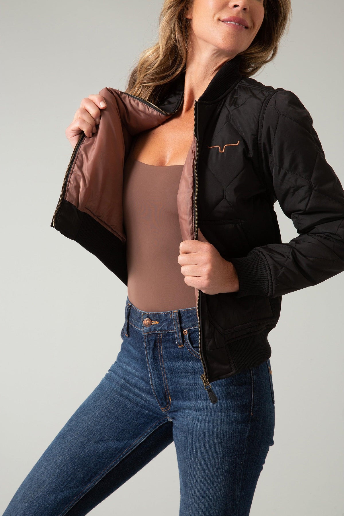 Kimes Ranch Marino Bomber Jacket in Black with quilted diamond stitching and a Kimes Ranch logo on the chest