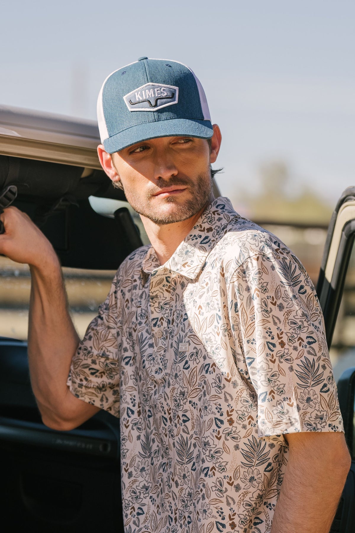 Kimes Ranch Bartram polo in Natural with a floral print and short sleeves