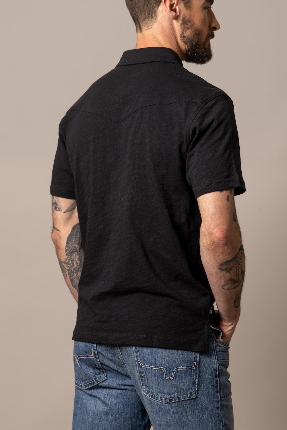 Kimes Ranch G-2 Polo in Black, back view, with a back yoke and short sleeves
