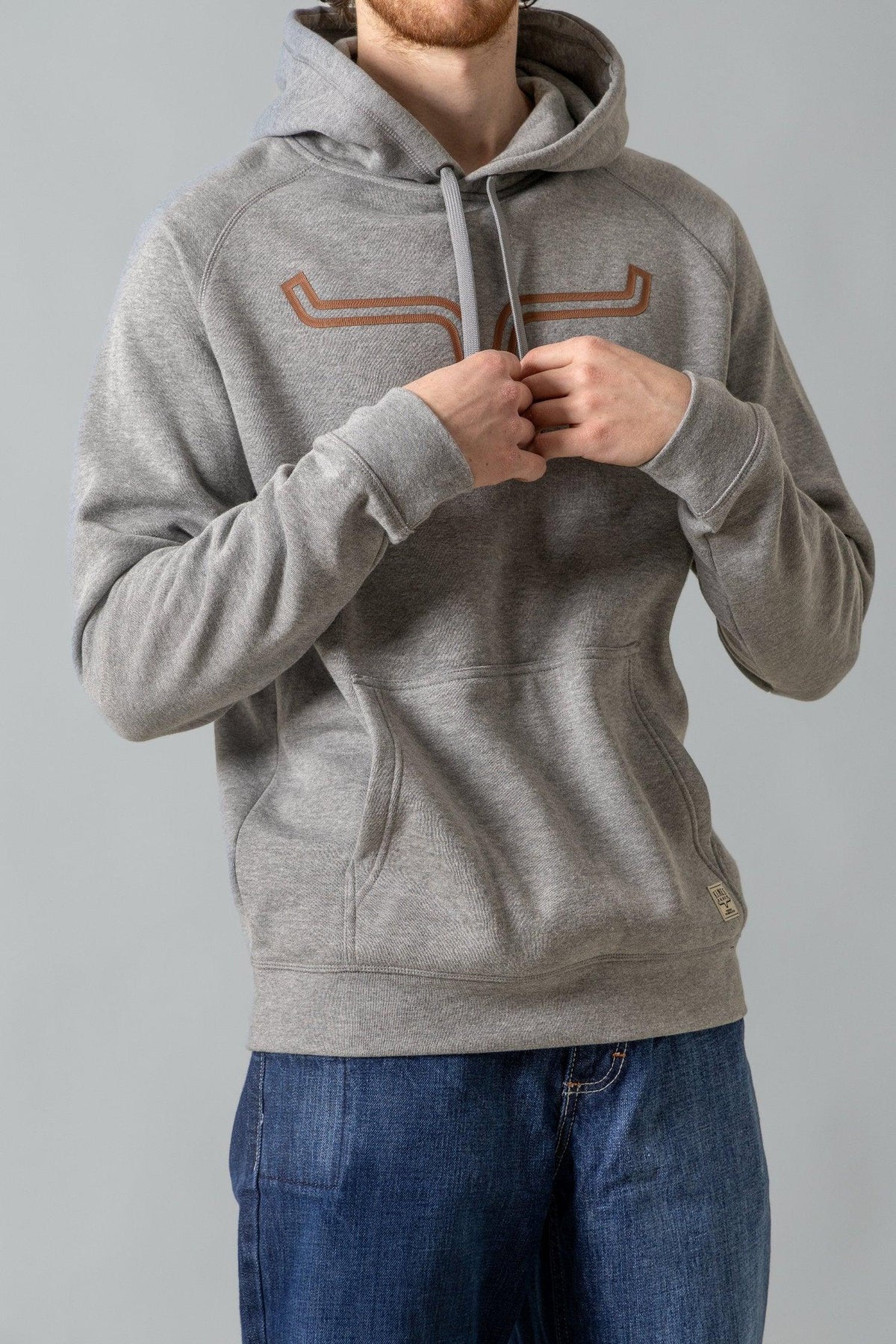 Kimes Ranch Outlier Hoodie in Grey Heather with a front kangaroo pocket and embroidered logo on the chest
