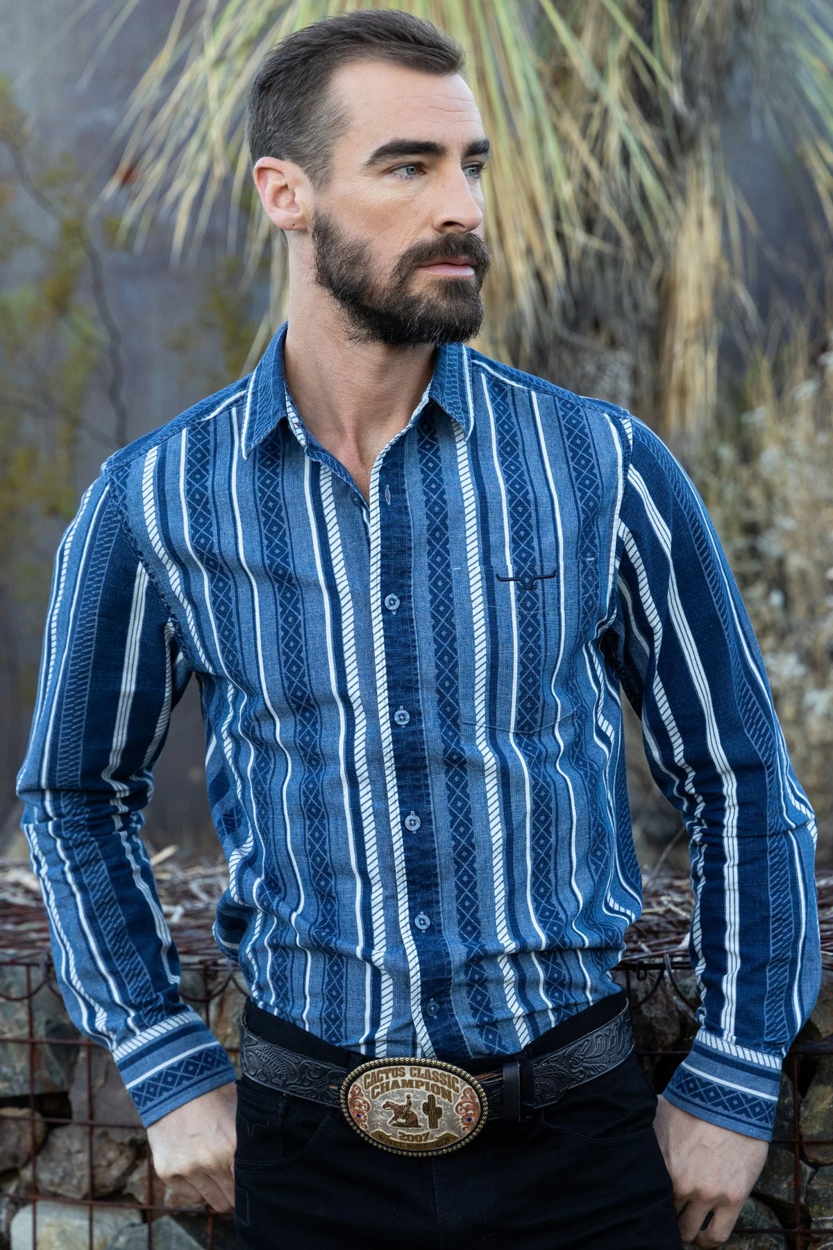 Kimes Ranch Tombstone long sleeve dress shirt in blue with white vertical stripes and geometric patterns
