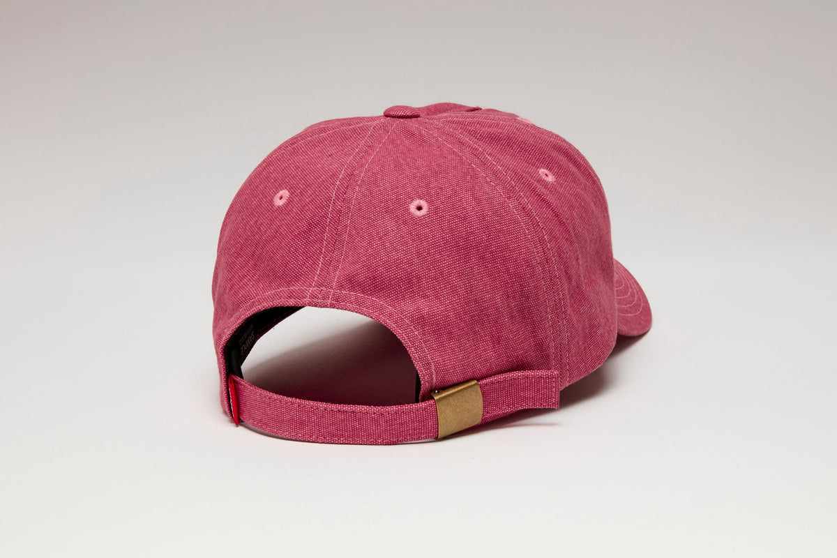 Kimes Ranch Mini Hux Hat in Brick Red, back view, with a brass buckle and eyelets