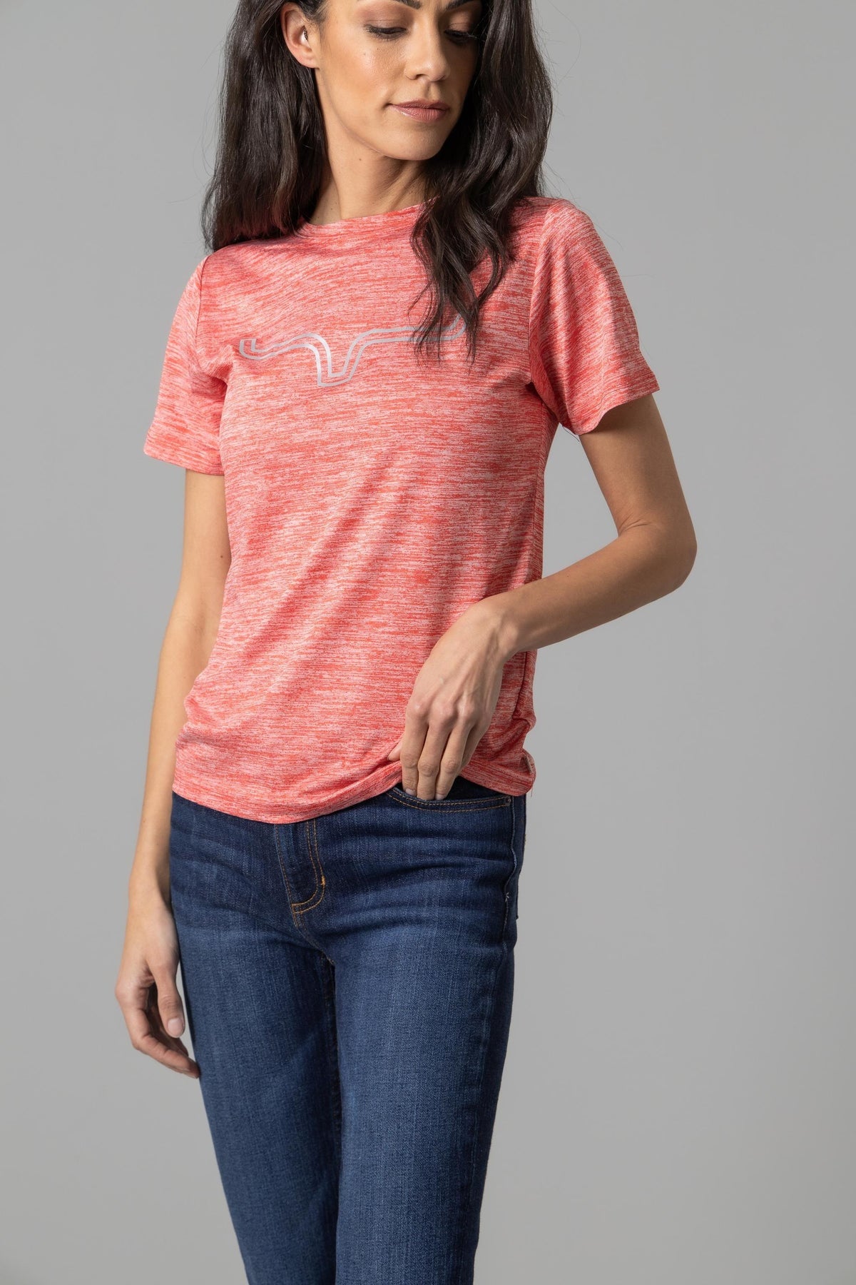 Kimes Ranch Ladies Outlier Tech Tee Shirt in Baked Apple Heather with a white logo graphic on the chest